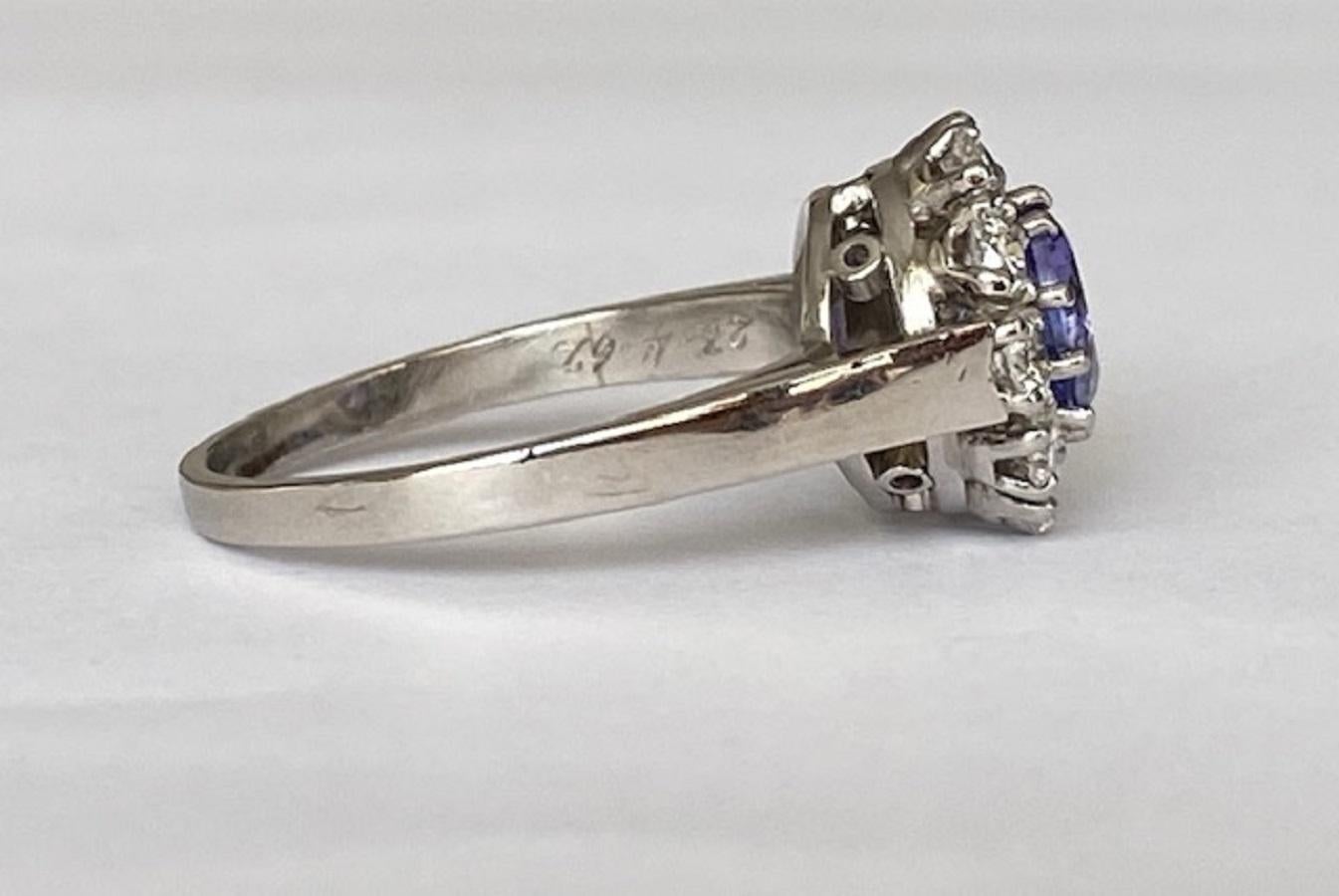 18 Kt. White Gold Rosette Diamonds Ring with 0.90 Ct Tanzanite  For Sale 1