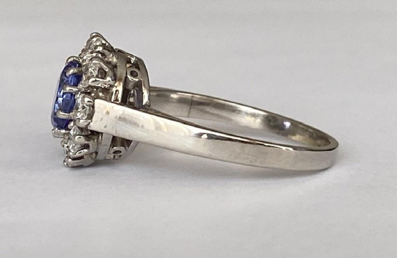 18 Kt. White Gold Rosette Diamonds Ring with 0.90 Ct Tanzanite  For Sale 2
