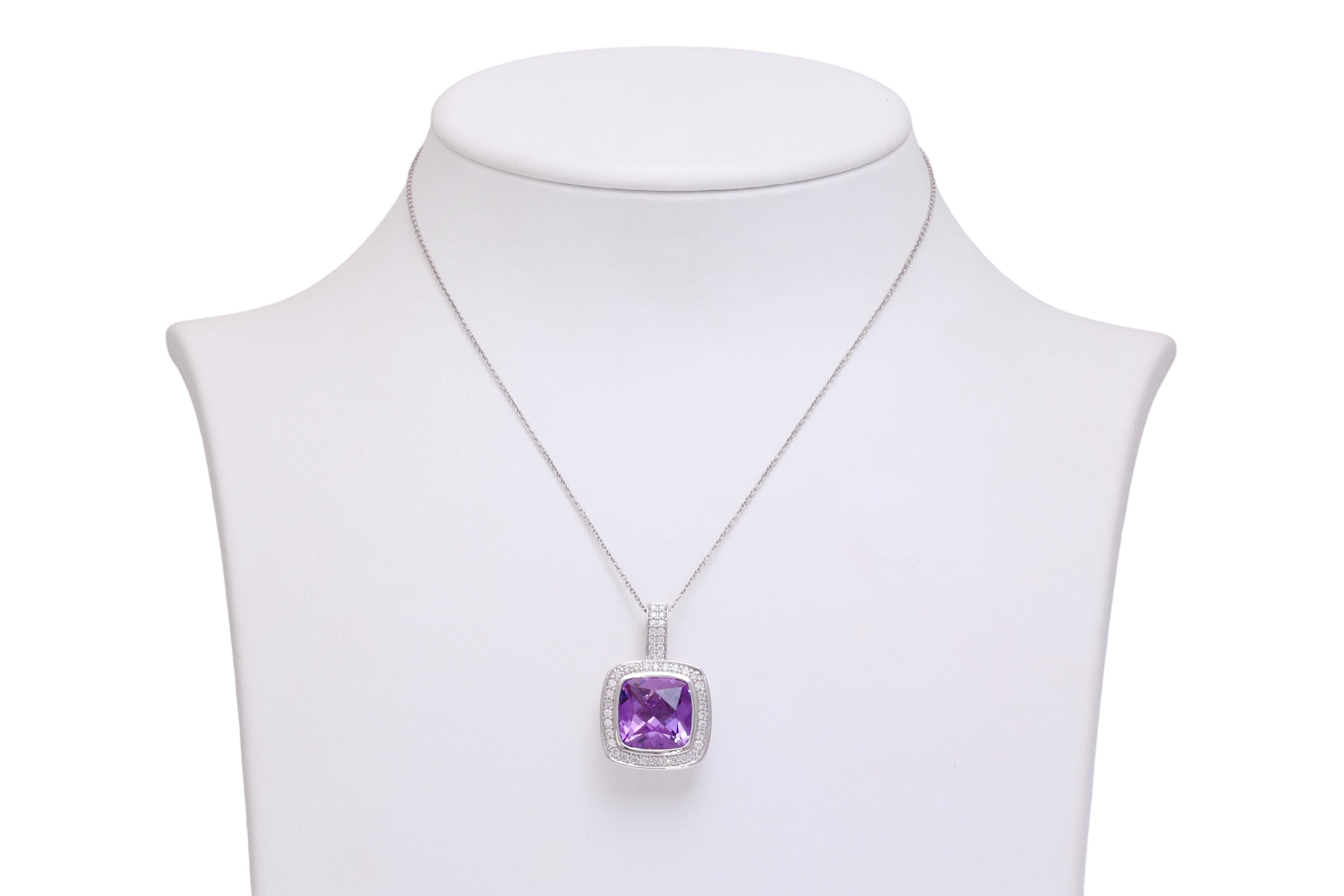 Magnificant 18 kt. White Gold Set Necklace, Earrings, Ring With Amethyst & Diamonds 

Necklace:
Diamonds: Brilliant cut diamonds, together 0.57 ct.
Amethyst: purple amethyst stone of  6 ct.
Material: 18 kt white gold
Measurements: Pendant: 17.7 mm x