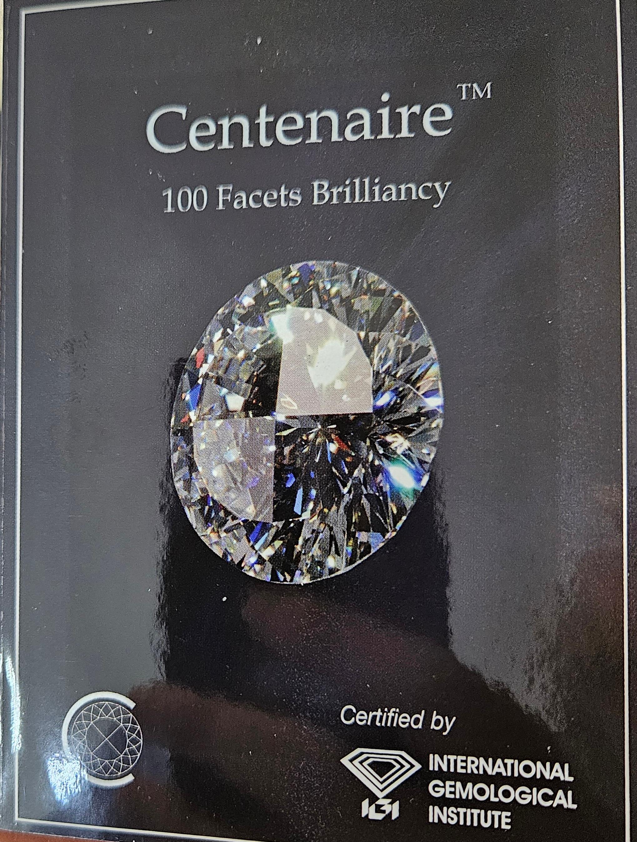 Bague solitaire unique Centenaire en or blanc 18 carats avec diamant central taillé à 100 facettes en vente 10