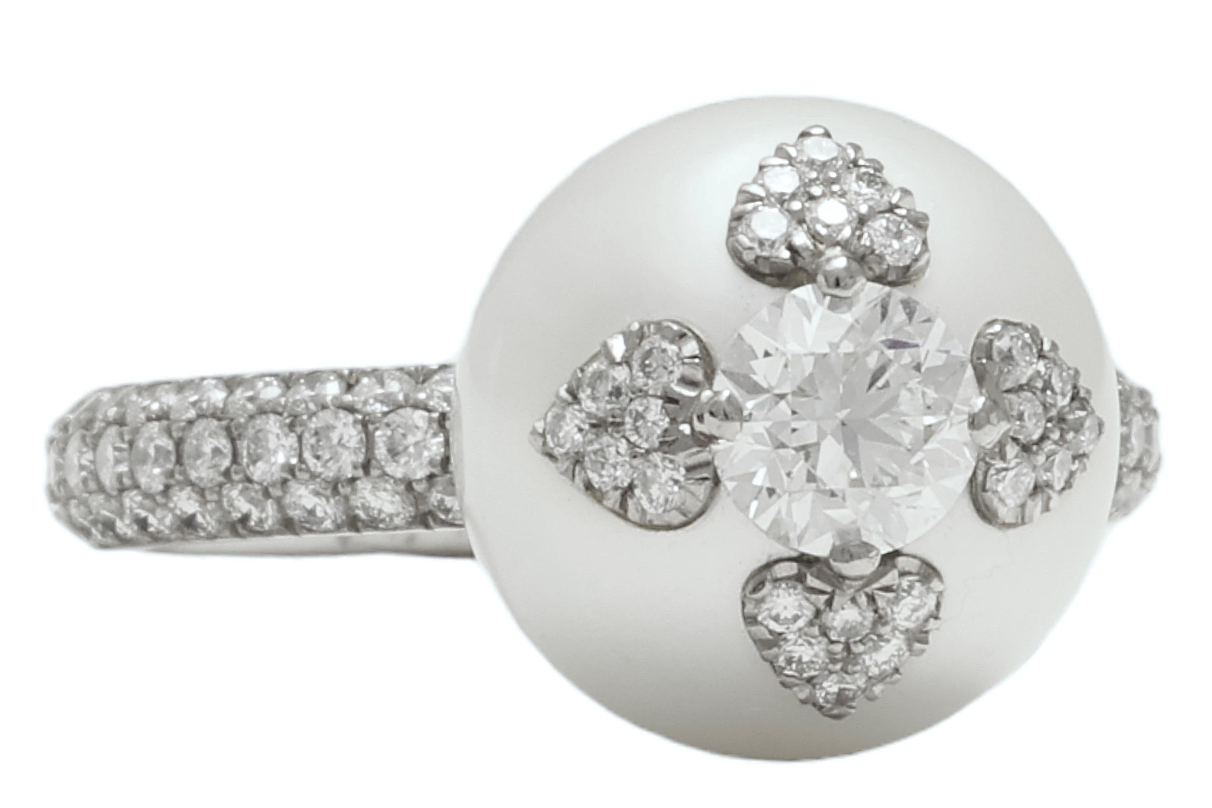 18 kt White Gold South Sea Pearl & Diamond Ring, one of a kind !

Diamonds : Center Brilliant Cut Diamond 0.65 carat Loupe Clan/VVS Clarity & D/E Color+ 2.1 Carat Brilliant Cut Diamonds from top Color & Clarity

Pearl : 13.4 mm South Sea Pearl with