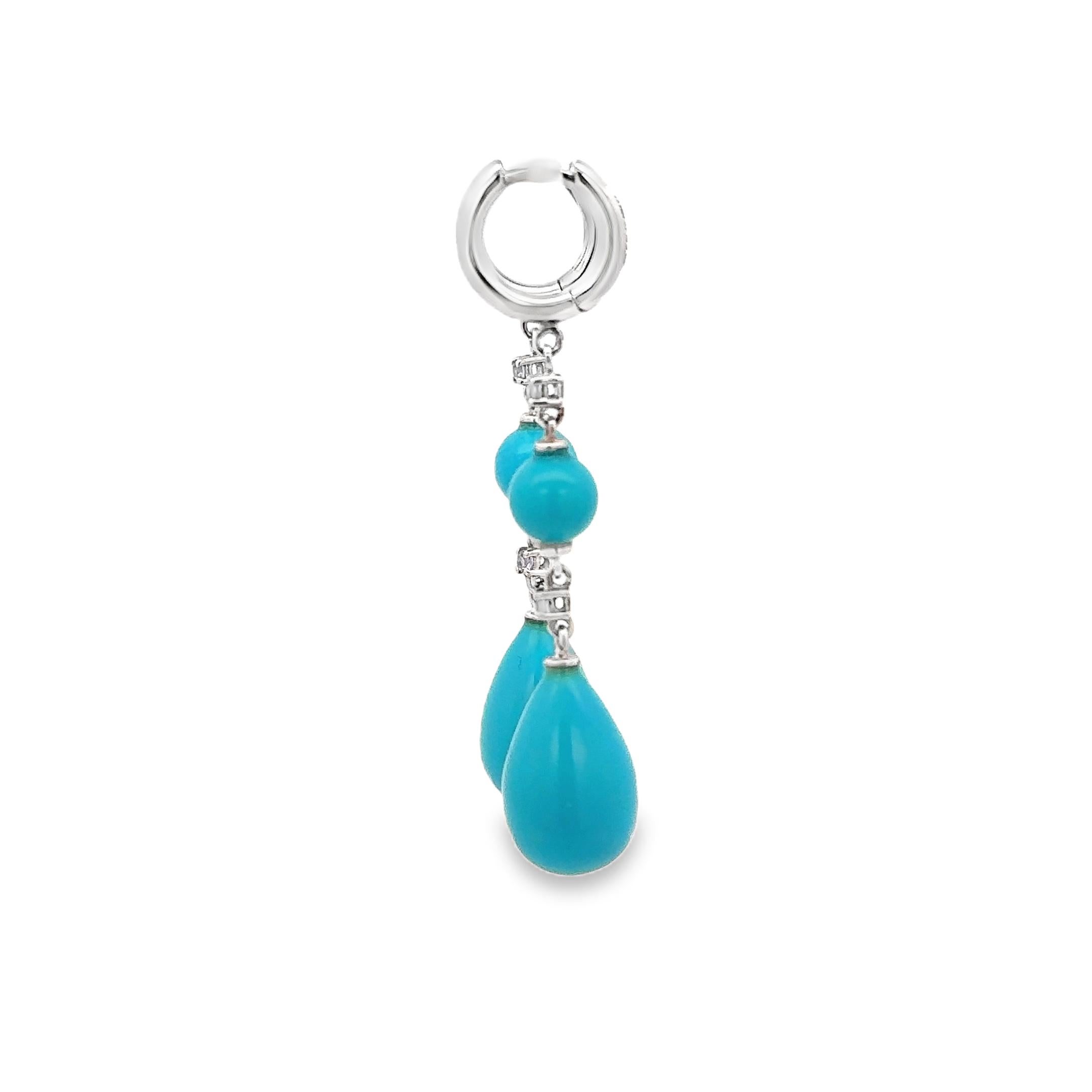 Eleganza con il modello Turchese e oro bianco 18 carati.  Orecchini pendenti Garavelli Sapphires. Questi squisiti orecchini, realizzati con precisione e stile, sono una testimonianza di bellezza e raffinatezza.
Ogni orecchino è un capolavoro in sé,