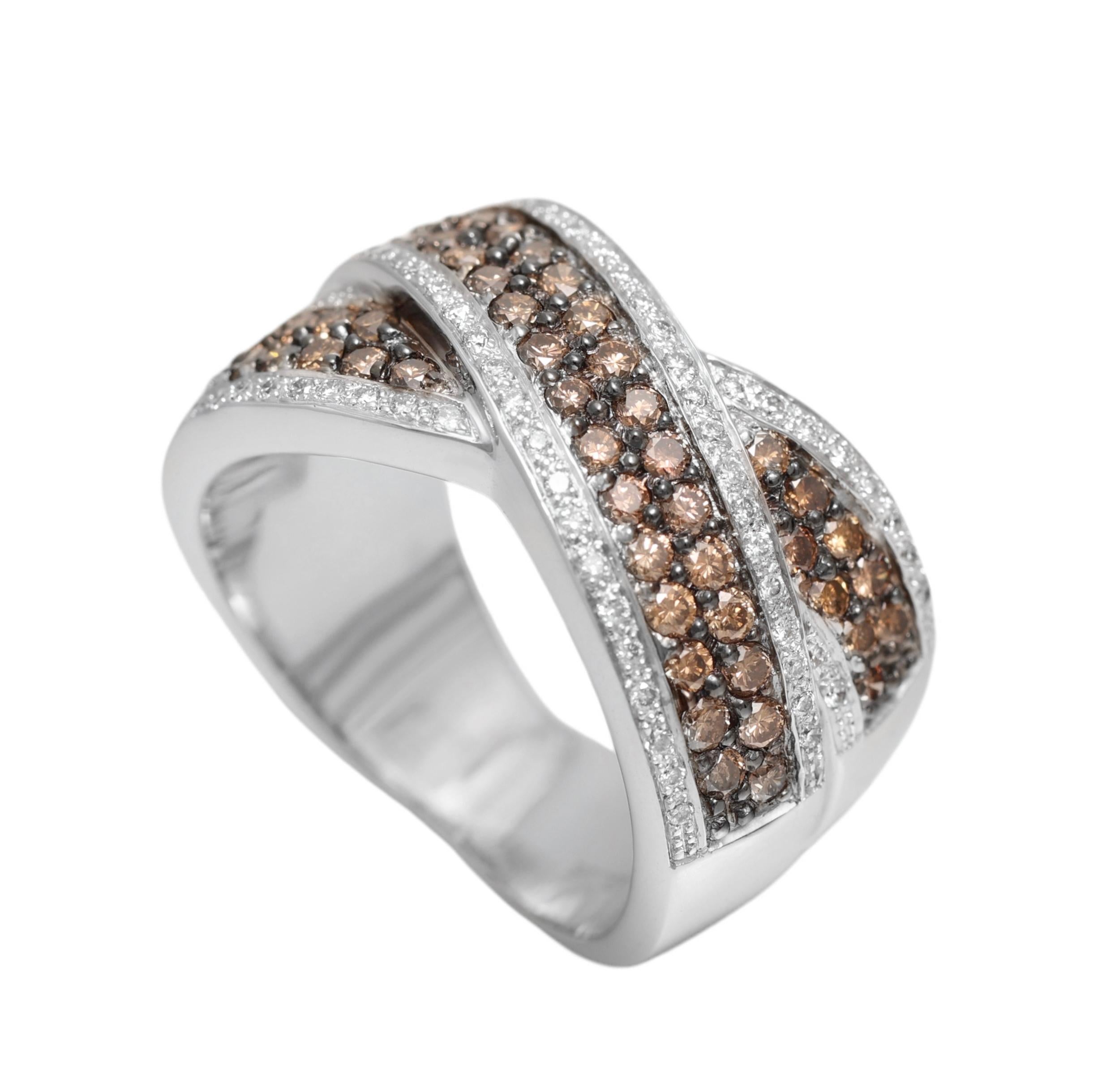 Gorgeous 18 kt. White Gold Wrap Ring With 1.6 ct. White and Cognac Diamonds 

Diamonds: Brilliant cut white diamonds, together approx. 0.60 ct. cognac diamonds together approx. 1 ct.

Material: 18 kt. white gold

Ring size: 57 EU / 8 US ( ring size