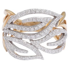 Bague en or blanc et jaune 18 Kt avec motif de feuilles et diamants