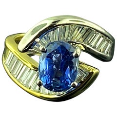 18 KT White & Yellow Gold Ring with a 4.03 Ct Blue Sapphire and 2.0 Cts Diamonds