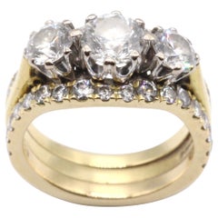 18 Kt Yellow and White Gold 2.16Ct Three-Stone Diamond and Eternity Cluster Ring