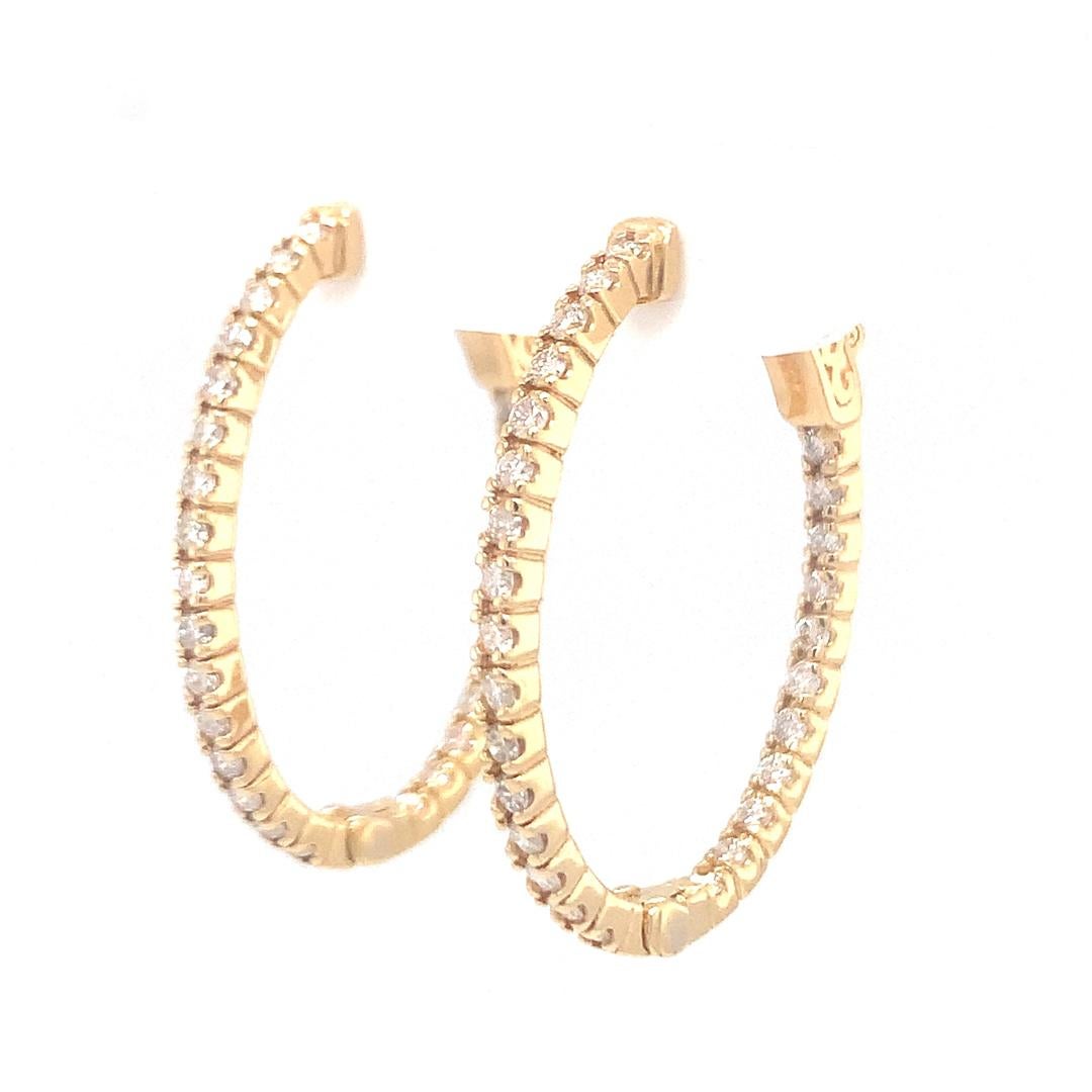 Round Cut 18-Kt Oval shaped 1.20 carat diamond hoop earrings For Sale