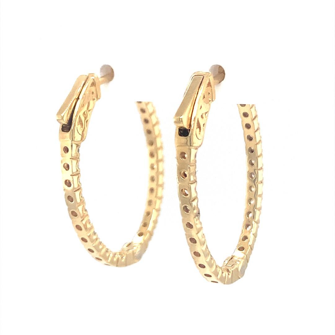 Women's 18-Kt Oval shaped 1.20 carat diamond hoop earrings For Sale
