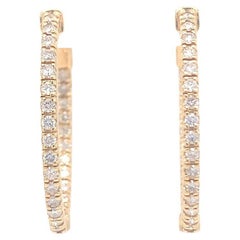18-Kt Oval shaped 1.20 carat diamond hoop earrings