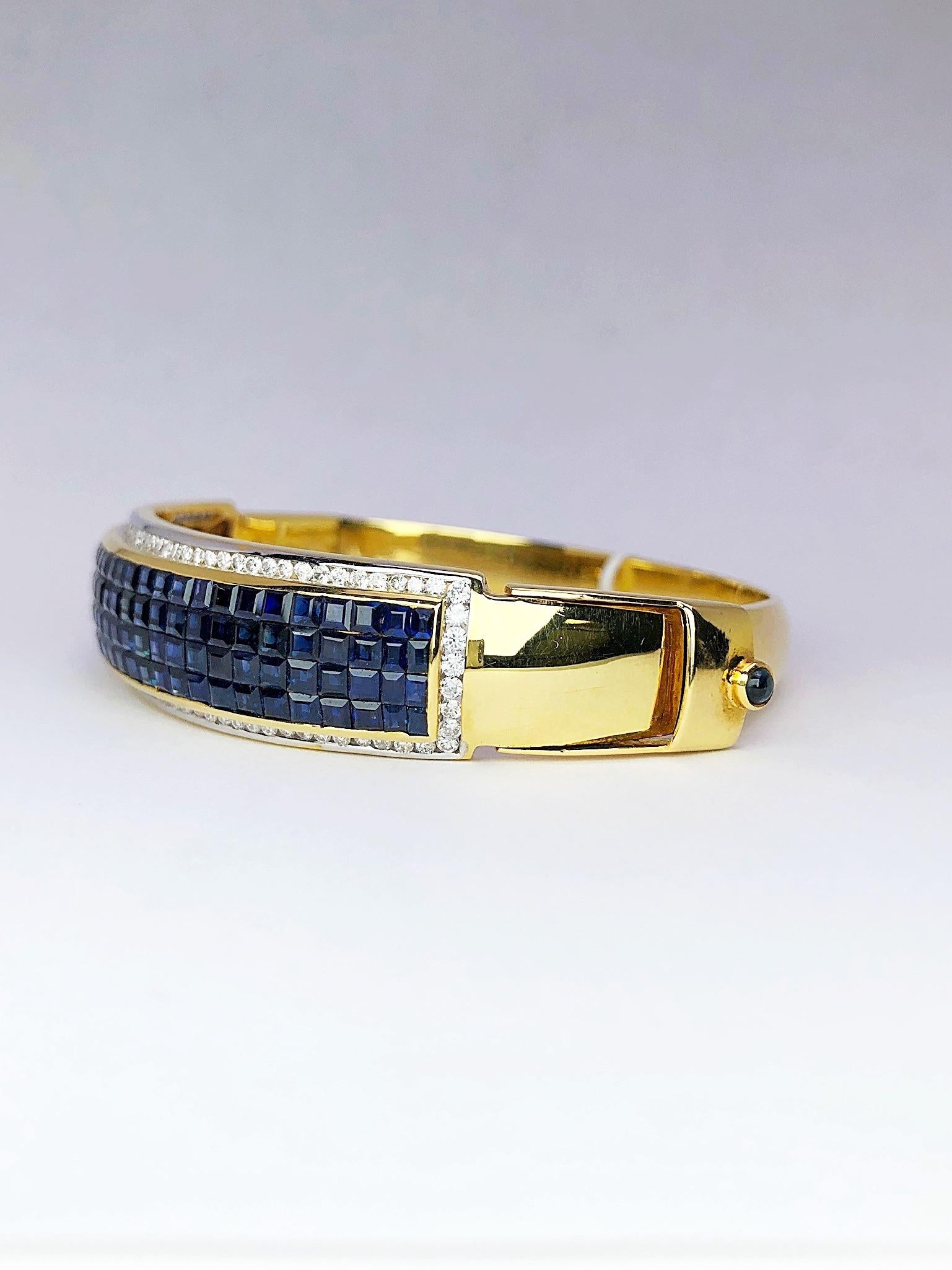 18 Karat Gold, 16.26 Carat Invisibly Set Sapphire and Diamond Bangle Bracelet In New Condition For Sale In New York, NY