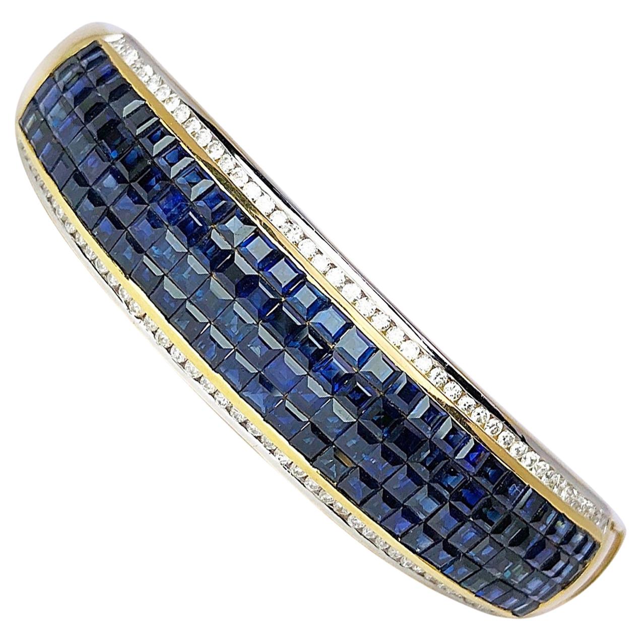 18 Karat Gold, 16.26 Carat Invisibly Set Sapphire and Diamond Bangle Bracelet For Sale
