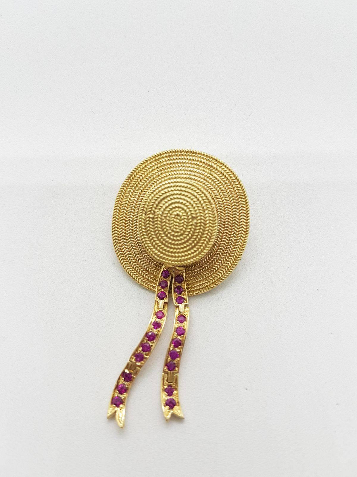 Hand made broach in Yellow 18KT gold with 1.32 carats of Rubies. Can be worn as a broach or a pendant.