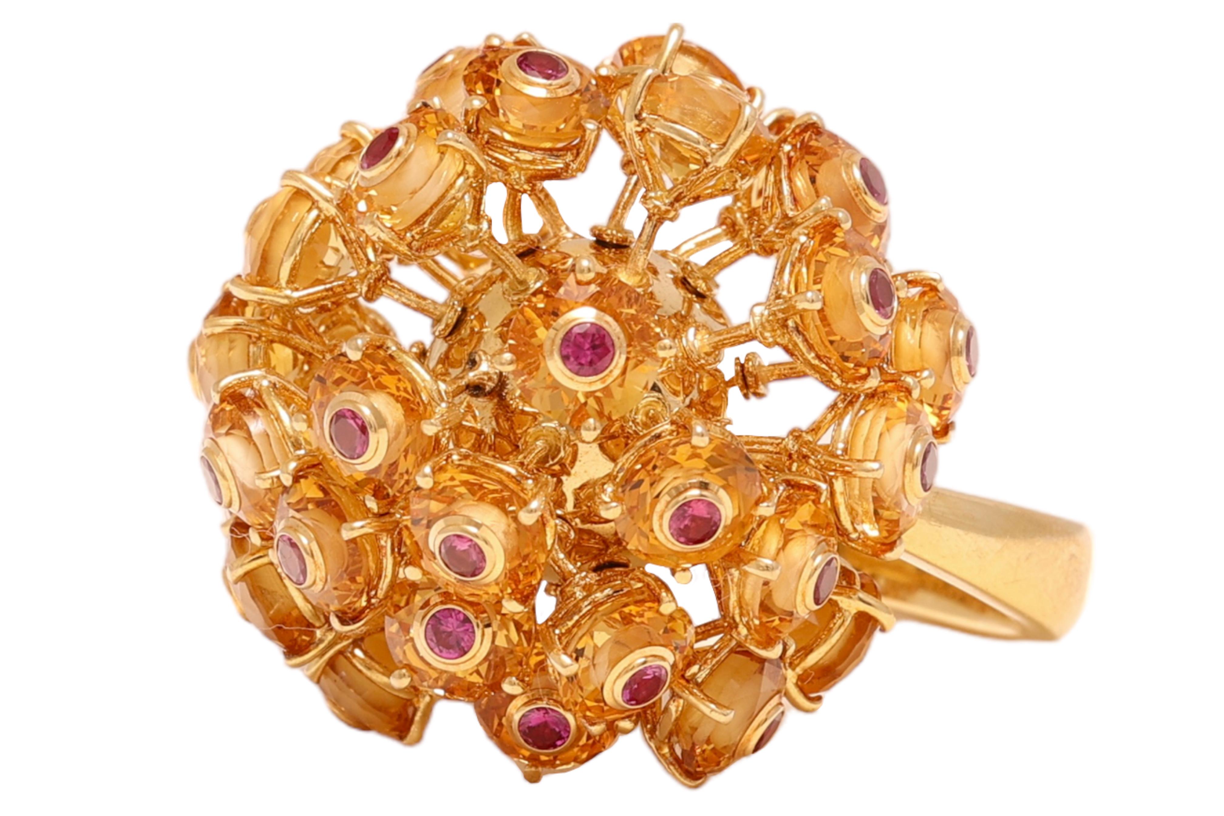 Gorgeous Original Ring in 18 kt. Yellow Gold Ball of Moving Rubies and Citrine

Ruby: Rubies together 1.65 ct.

Citrine: 

Material: 18 kt. Yellow gold

Ring size: 53 EU / 6.5 US, can be resized for free

Diameter head of ring 25.5 mm 

Total