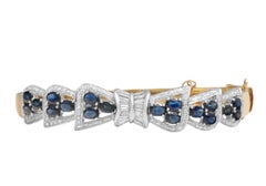 18 kt. Yellow Gold Bangle Bracelet With 2 ct Diamonds & 2.7 ct Sapphires