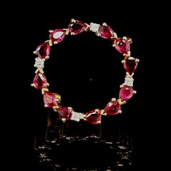 18 Karat Yellow Gold Brooch with Diamonds and Deep Red Rubies