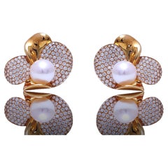 Orecchini a clip in oro giallo 18 Kt con diamanti e perle Akoya