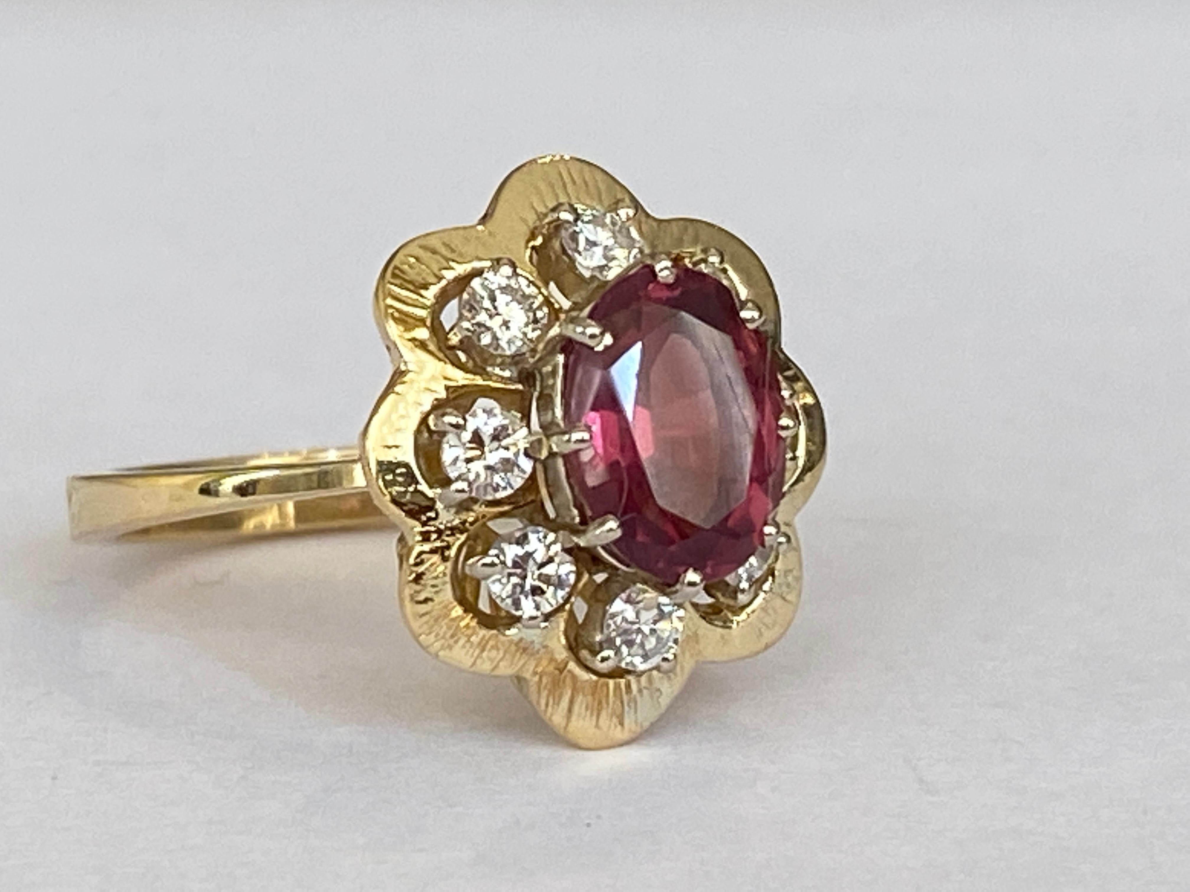 Contemporary 18 Kt. Yellow Gold Cocktail  Ring with 1.80 Ct Garnet and Diamonds For Sale