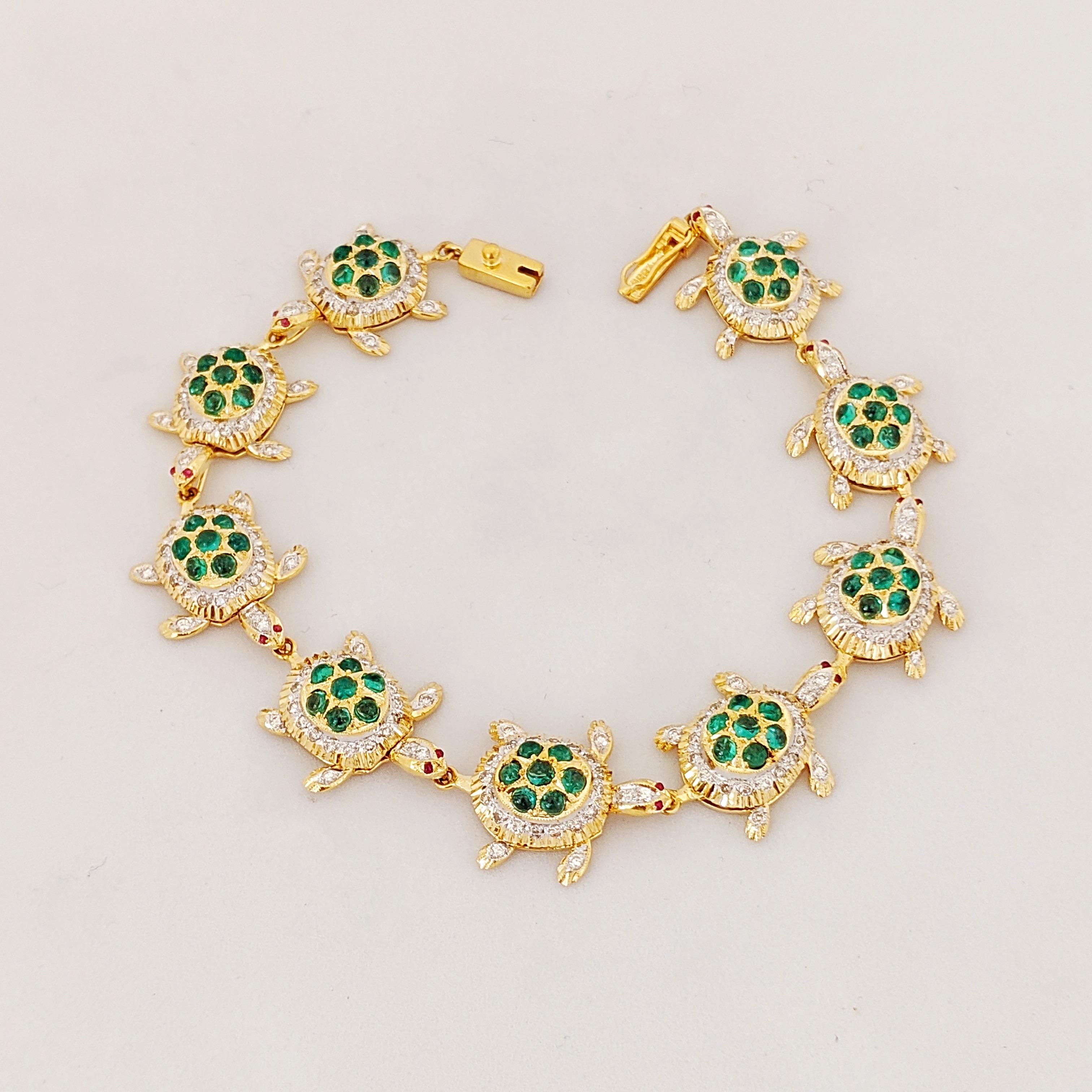 Turtles are said to represent good health and long life. This 18 karat yellow gold bracelet designed by
Assil has 9 lucky turtles . Each turtle is set with round brilliant Diamonds , beaded Emeralds, and Rubies. Each turtle measures 3/4