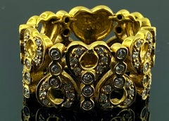 18 Karat Yellow Gold Flexible Band with Diamonds