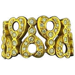 18 Karat Yellow Gold Flexible Band with Diamonds