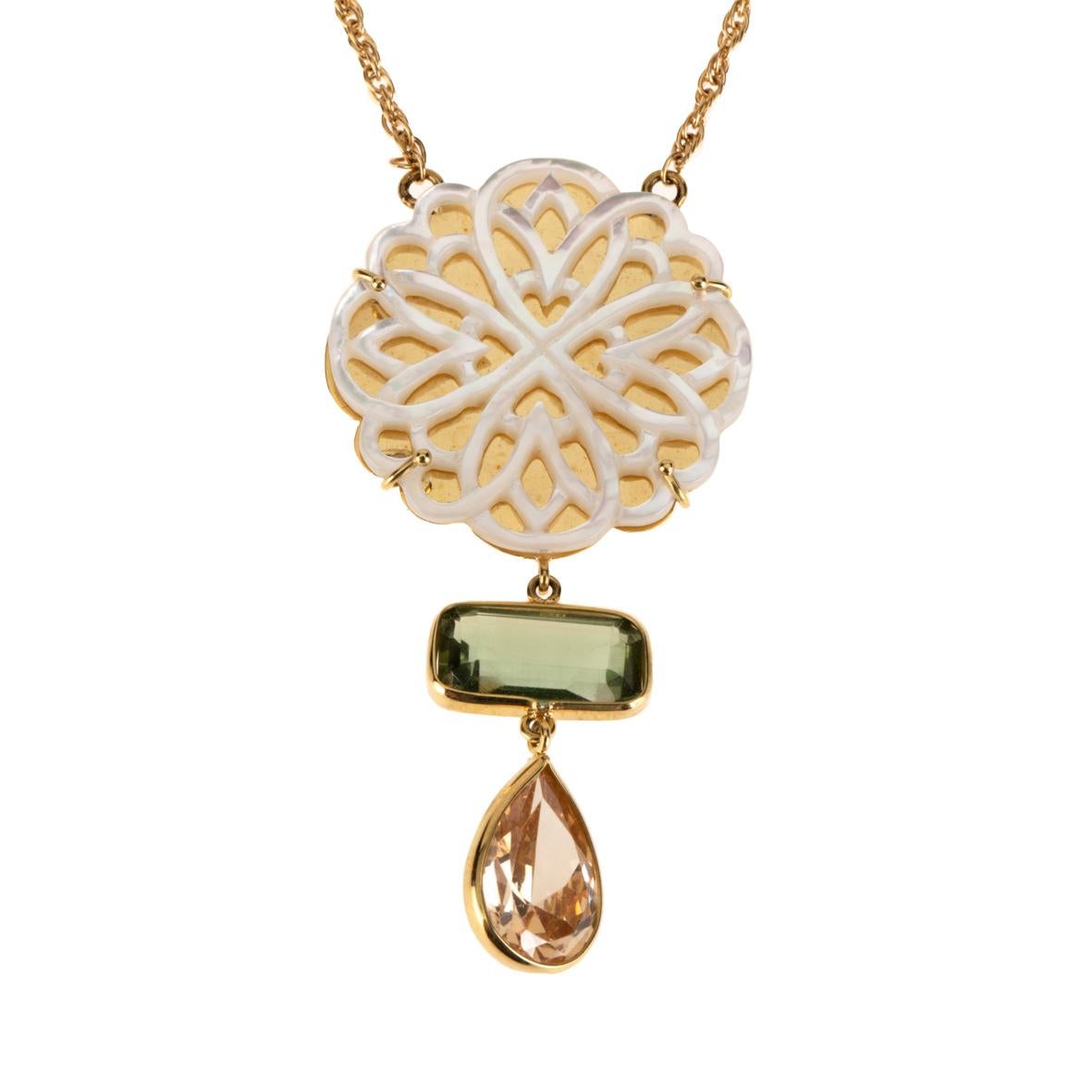 18 kt Gold gr 14,70, rare Green Amethyst, Opal Drop, and carved Mother of pearl lied in a Gold mirror plate that reflecting light.
All Giulia Colussi jewelry is new and has never been previously owned or worn. Each item will arrive at your door