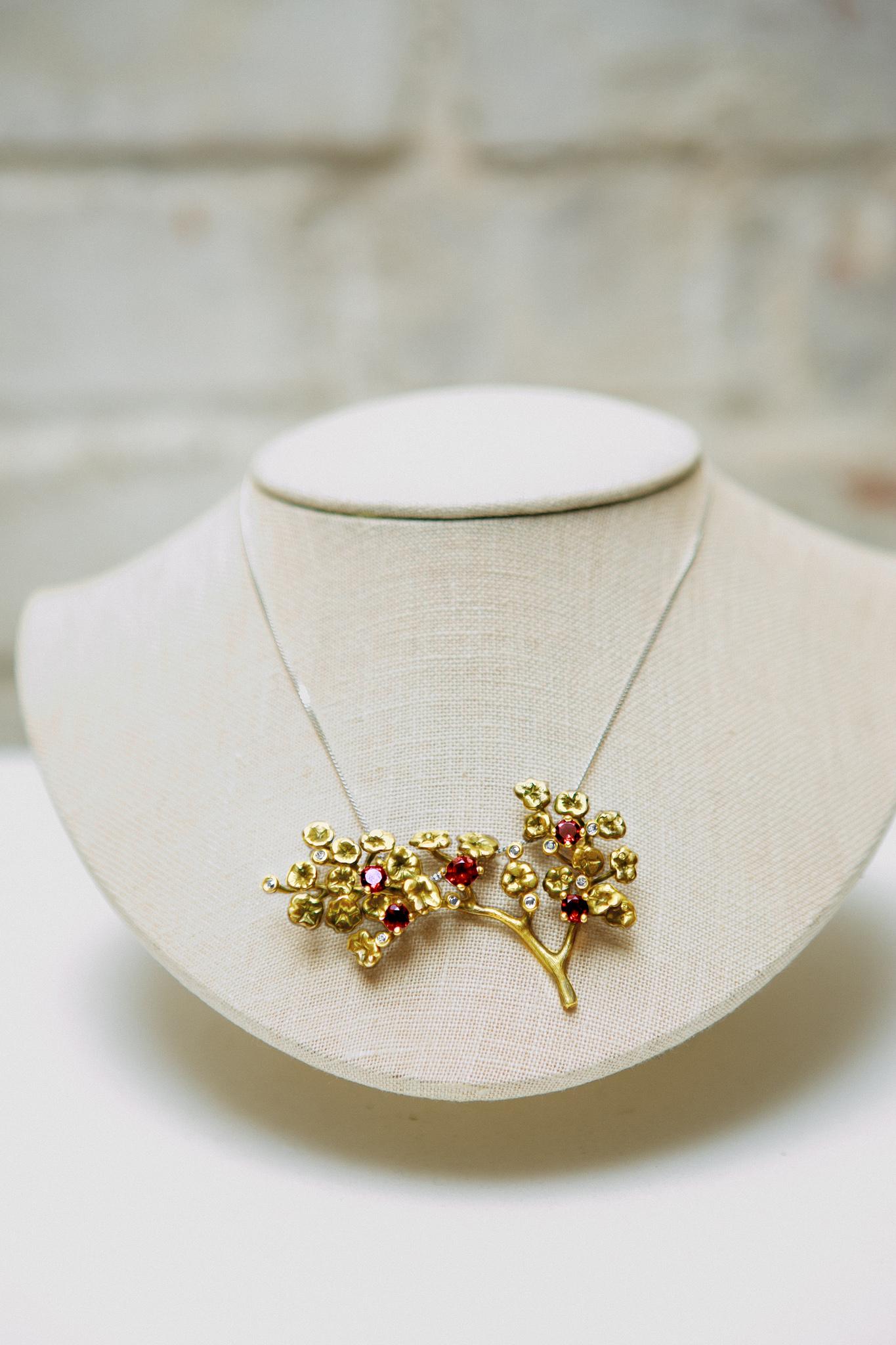This 18 karat yellow gold Heliotrope necklace is a jewelry art object, designed by the oil painter from Berlin, Polya Medvedeva.

The necklace is 70 cm long and can be ordered with multiple choices of precious gems. This necklace is encrusted with