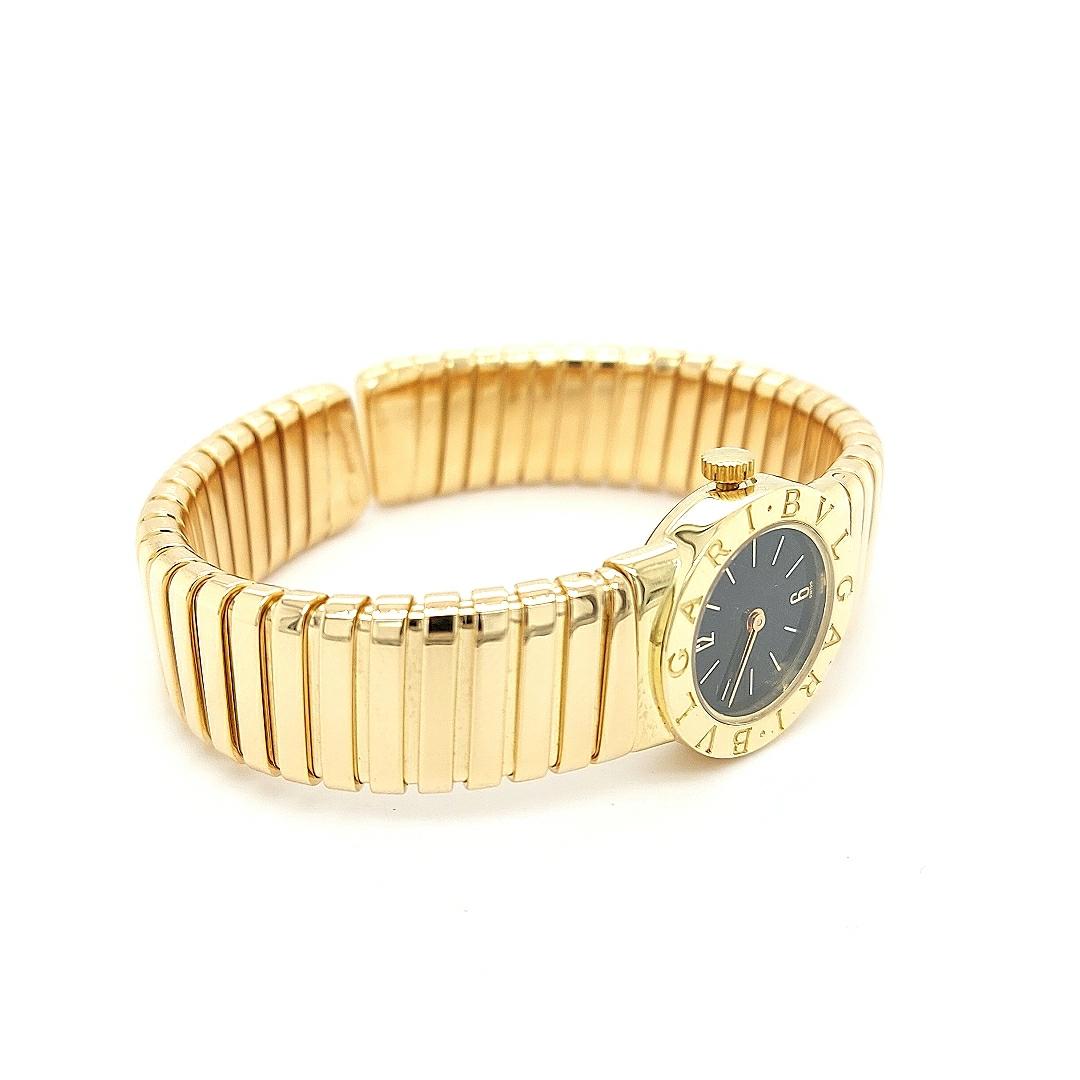 18 Karat Gelbgold Damen Bvlgari Tubogas Armbanduhr mit schwarzem Zifferblatt (Moderne) im Angebot