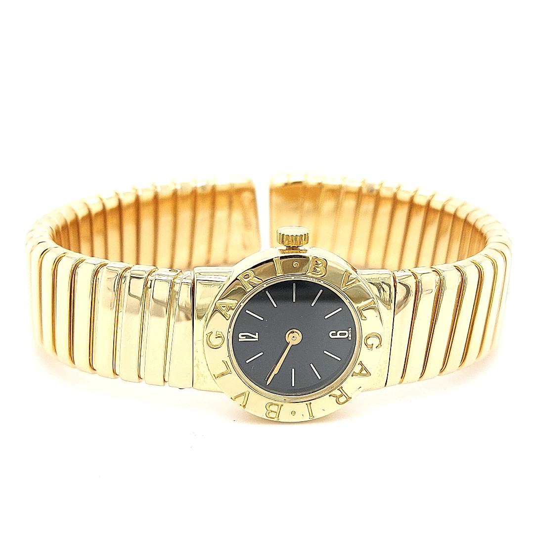 18 Karat Gelbgold Damen Bvlgari Tubogas Armbanduhr mit schwarzem Zifferblatt für Damen oder Herren im Angebot