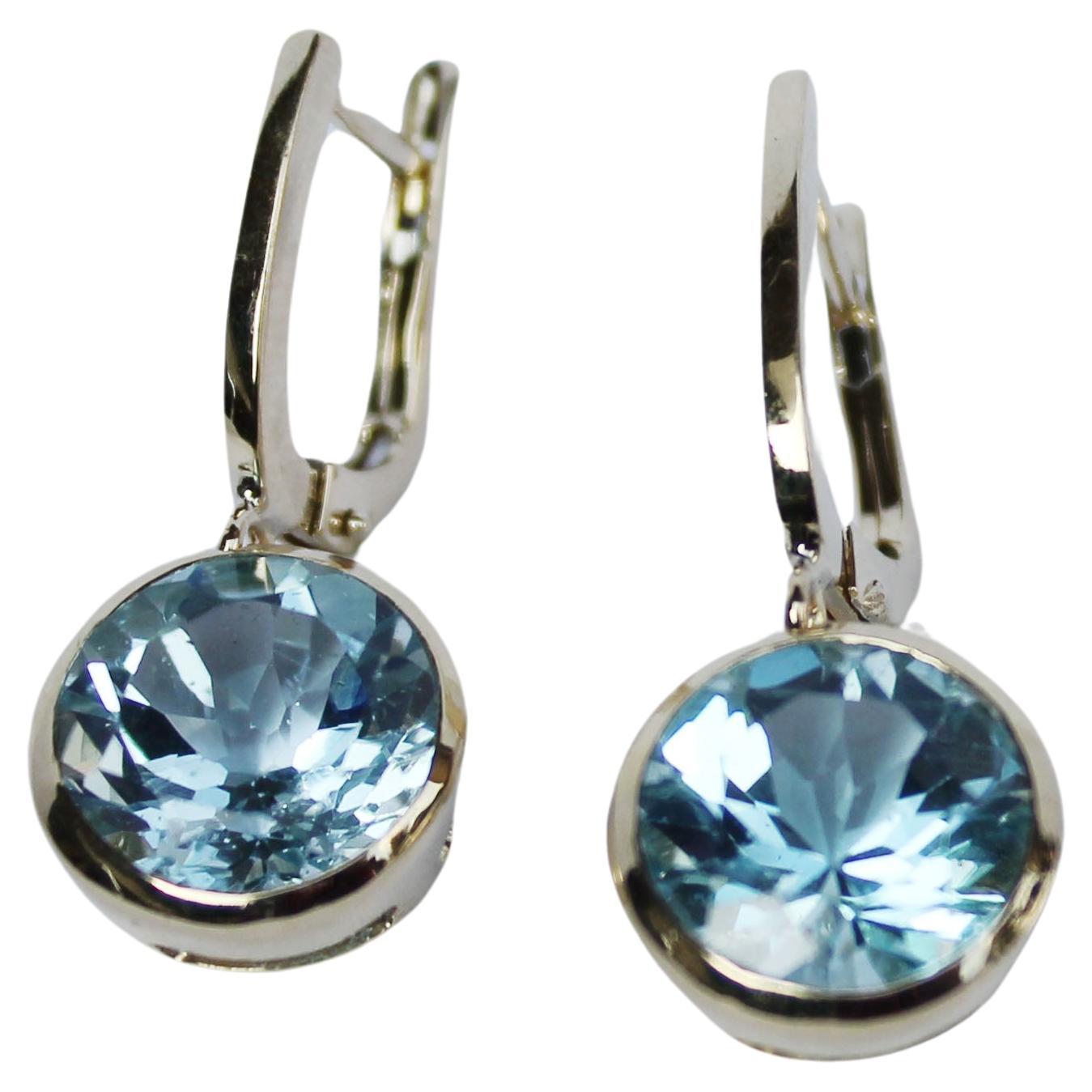 Earrings in yellow gold 18 Karat with light blue Topaz (round cut, size: 10 mm)

All Stanoppi Jewelry is new and has never been previously owned or worn. Each item will arrive at your door beautifully gift wrapped in Stanoppi boxes, put inside an
