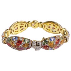 Pulsera de Oro Amarillo de 18 Kilates Zafiro Multicolor y Diamantes