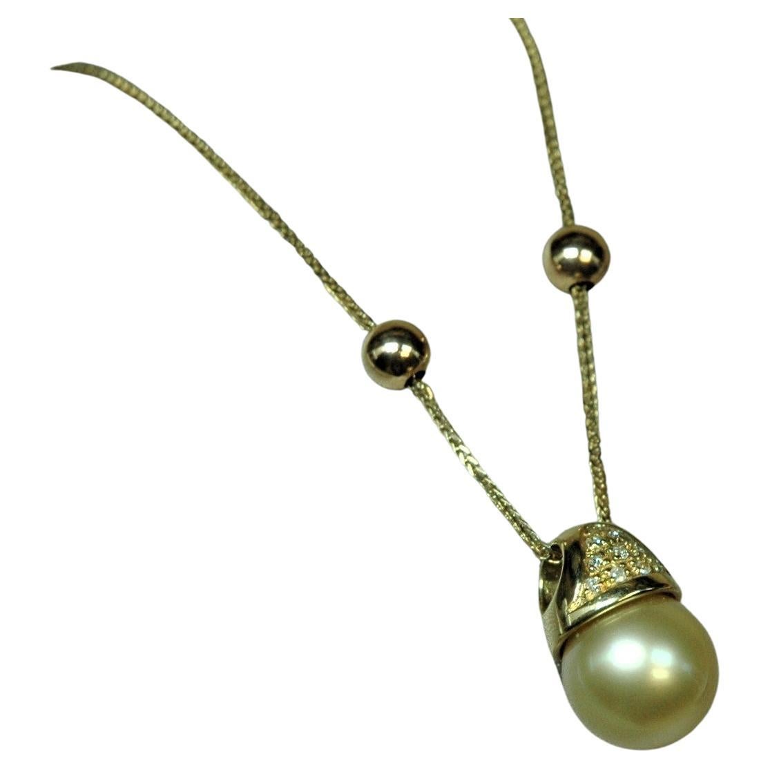 18 Kt Yellow Gold Pendant Necklace with Diamonds and a Gold Pearl For Sale