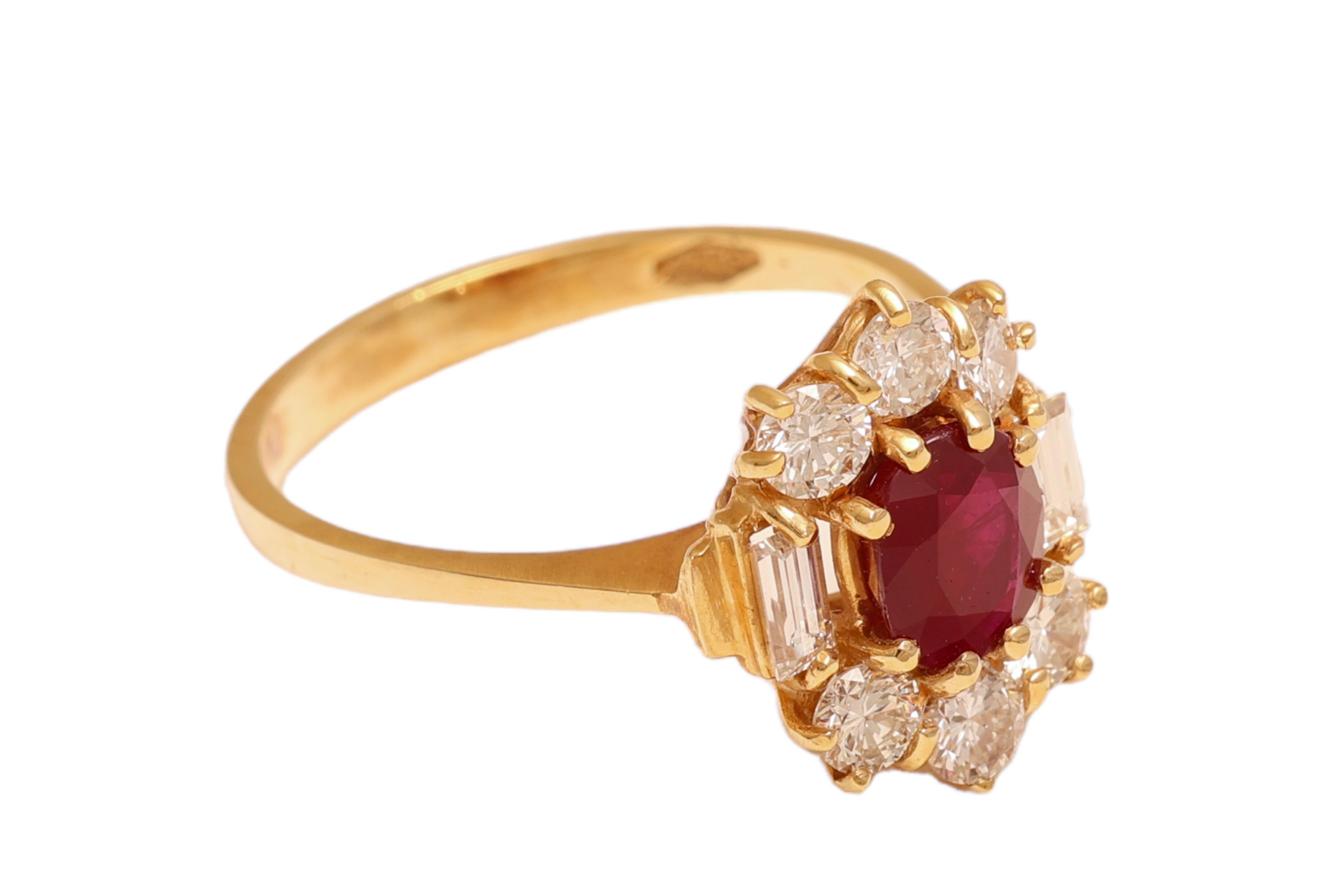 Gorgeous 18 kt. Yellow Gold Ring with Oval Ruby of 1.4 ct. and Diamonds of 1 ct. Together 

Ruby: Oval red ruby of  1,40 ct.

Brilliant cut : Brilliant cut & baguette cut diamonds together 1 ct. 

Material: 18 kt. yellow gold

Ring size: 57 EU / 8