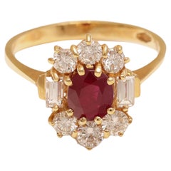 18 kt. Bague en or jaune avec rubis ovale 1,4 carat et 1 carat Diamants taille brillant 