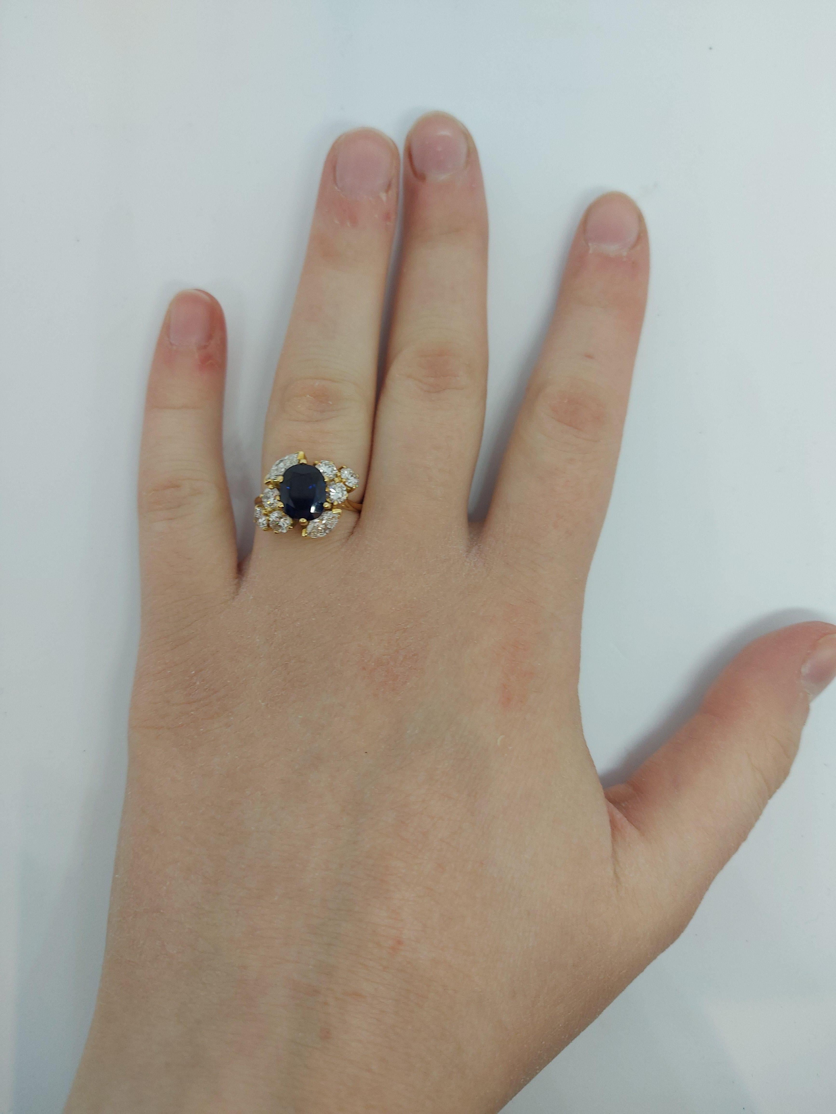 18 Karat Yellow Gold Ring with Oval Sapphire, Marquise and Round Cut Diamonds 14