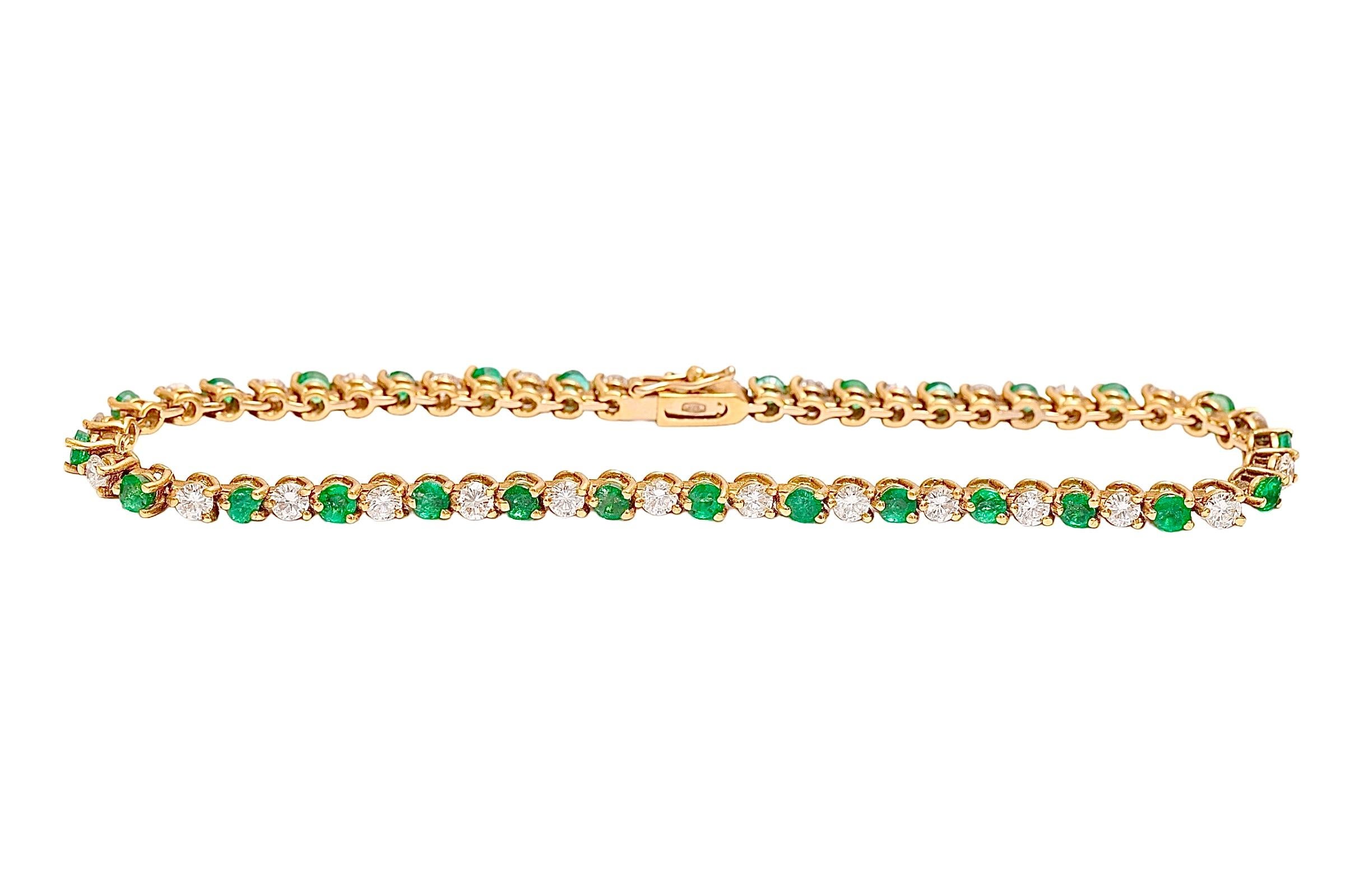 Artisan 18 kt. Yellow Gold Tennis Bracelet with 1.68 Diamonds and 1.96 ct. Emeralds For Sale