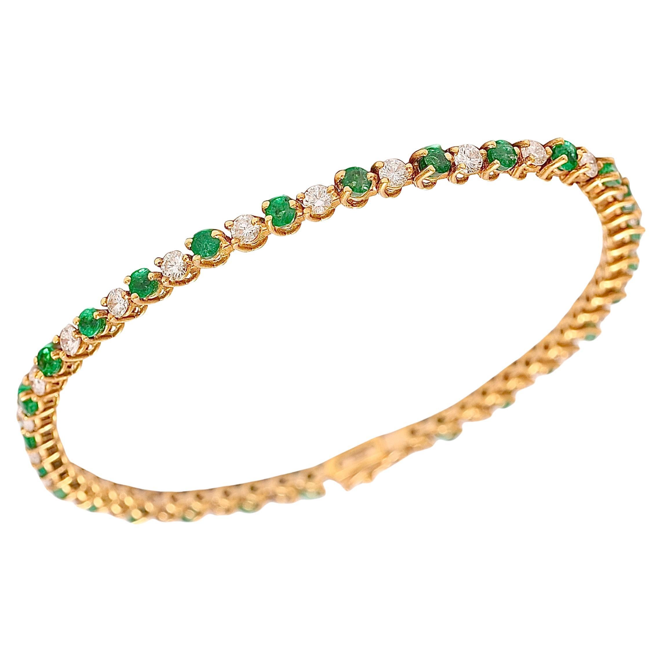 18 kt. Yellow Gold Tennis Bracelet with 1.68 Diamonds and 1.96 ct. Emeralds For Sale