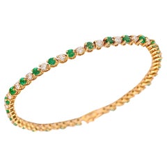 18 kt. Bracciale Tennis in oro giallo con 1,68 diamanti e 1,96 ct. Smeraldi