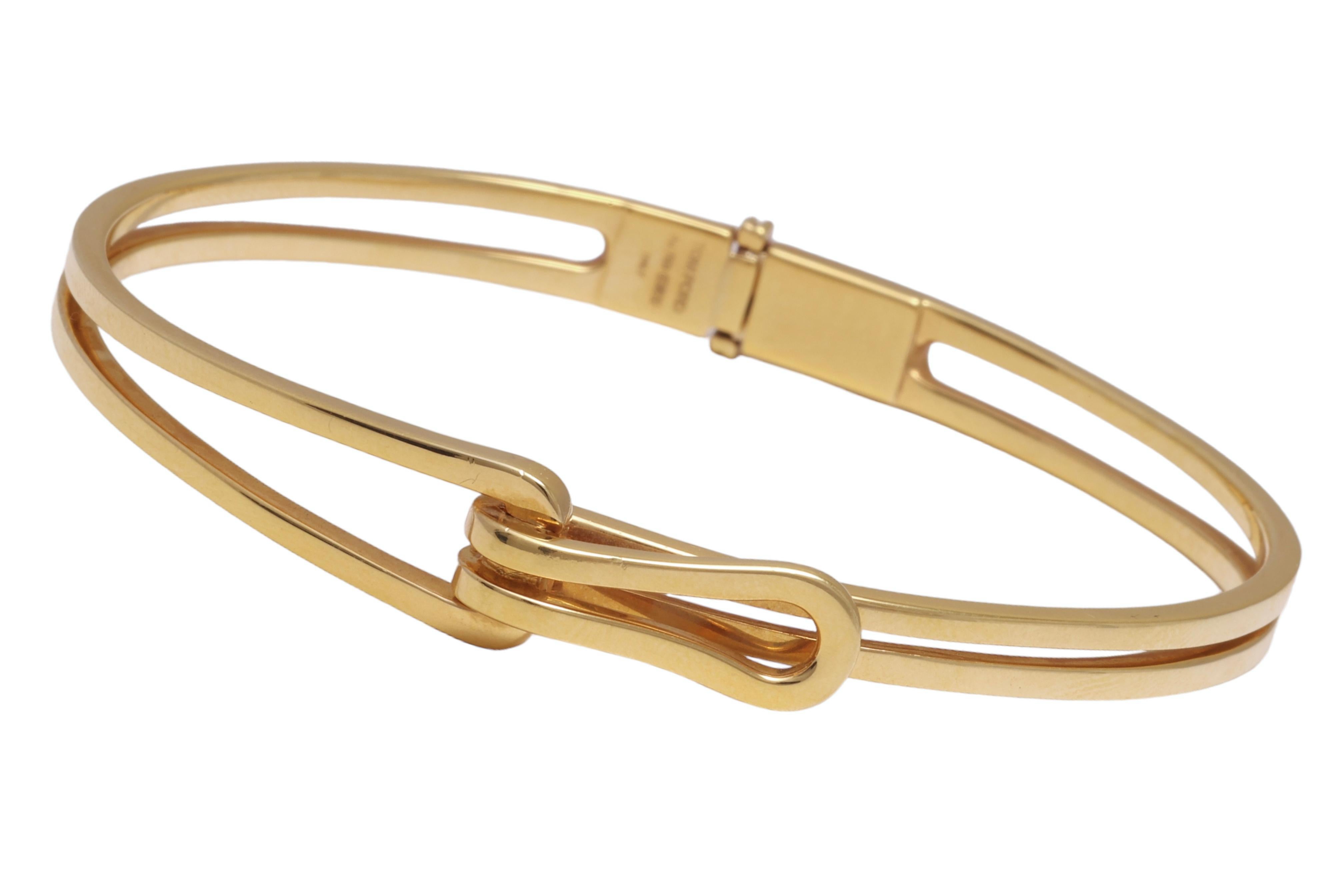 18 kt. Yellow Gold Tom Ford Interlocked Bracelet, Comes in the original Tom Ford Box

Bracelet:
Material: 18 kt. yellow gold
Measurements: Will max fit a  19 cm wrist
Total weight: 28.7 gram / 1.015 oz / 18.5 dwt

Possible to buy the matching ring