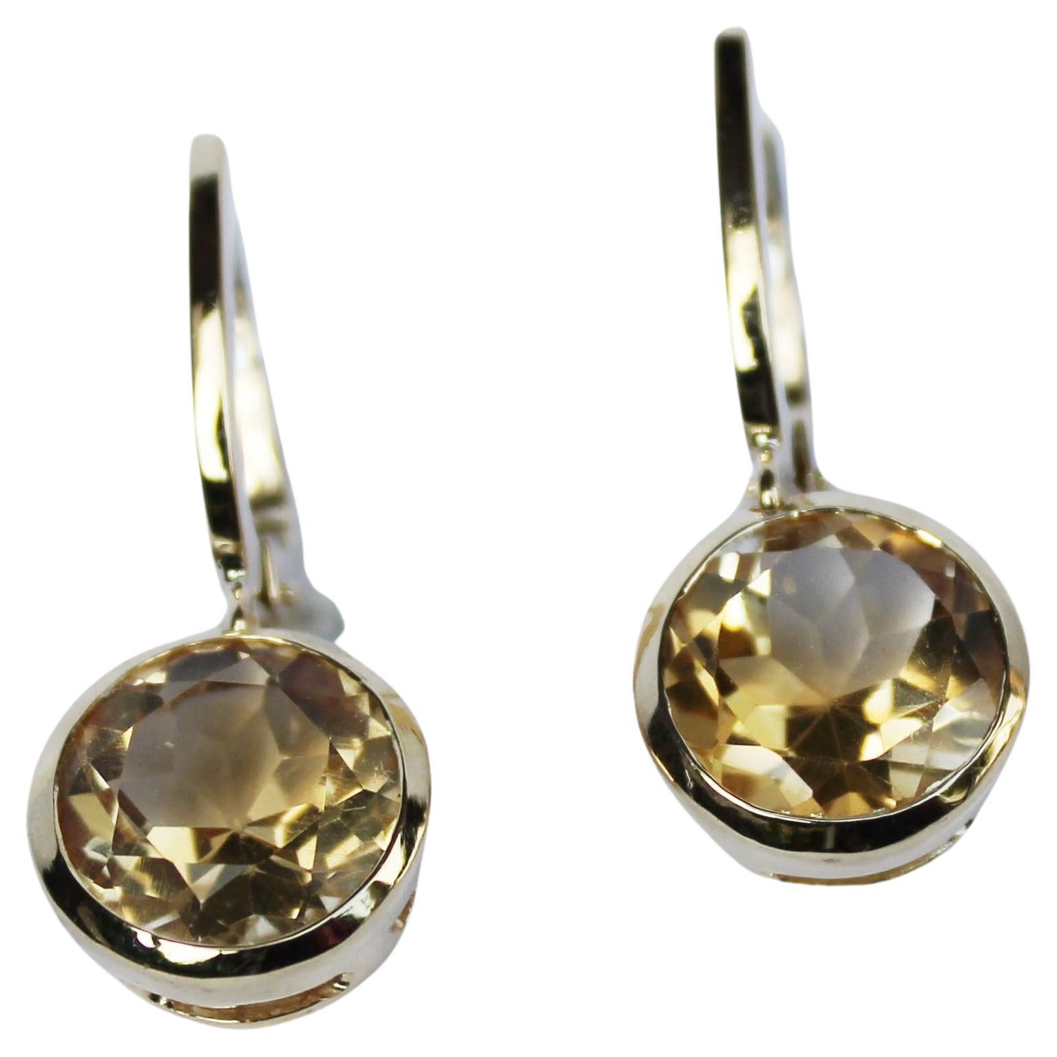 Earrings in yellow gold 18 Karat with Citrine (round cut, size: mm)

All Stanoppi Jewelry is new and has never been previously owned or worn. Each item will arrive at your door beautifully gift wrapped in Stanoppi boxes, put inside an elegant pouch