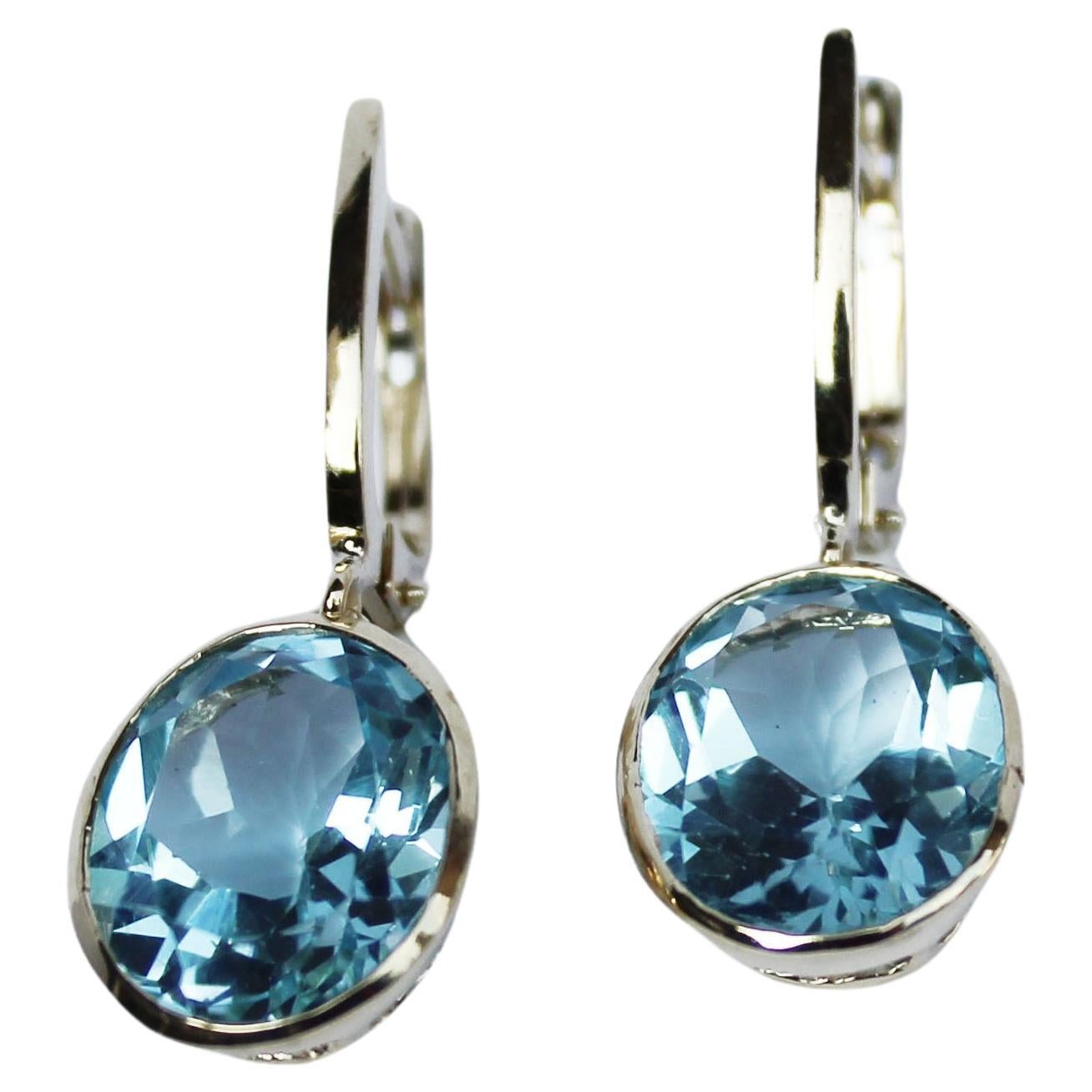 Earrings in yellow gold 18 Karat with light blue Topaz (oval cut, size: 10x12mm)

All Stanoppi Jewelry is new and has never been previously owned or worn. Each item will arrive at your door beautifully gift wrapped in Stanoppi boxes, put inside an