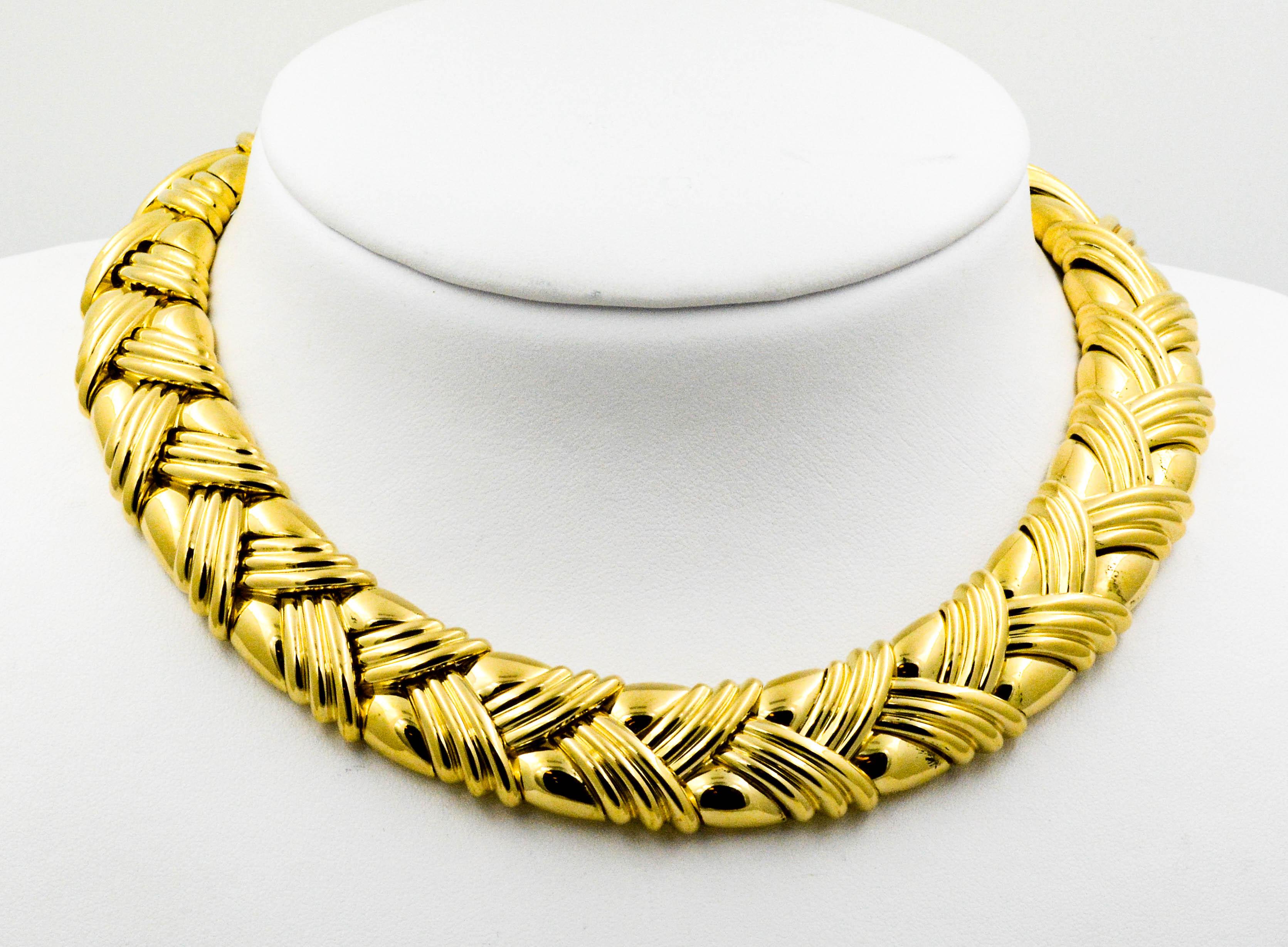 Circa 1980's 18 Karat Yellow Gold 16 inch Basket Weave Collar Necklace in excellent condition. 18 mm wide with an integrated clasp.