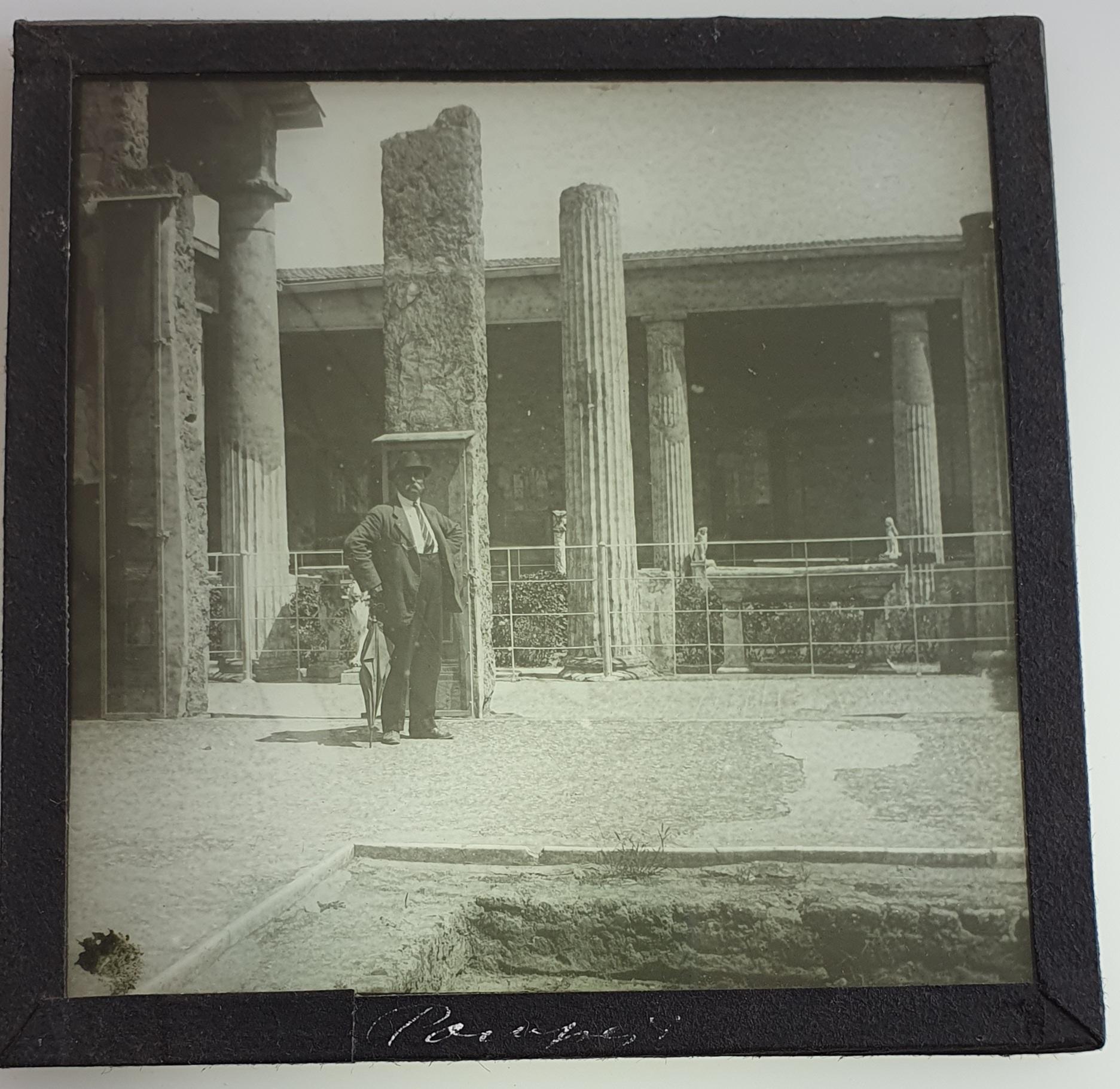 20 Antique glass lantern slides with motifs of Italy.

1. Pompeii, man standing in front of columns 
2. Venice, St. Salute
3. Rome, Castle Sant'Angelo
4. Pompeii, Civil forum
5. Isola Bella, Lago Maggiore
6. Milan, Arch of peace. Portraying