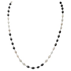 Collana da 18" con diamanti naturali neri e grigi (40,00ct) in oro bianco 14 carati
