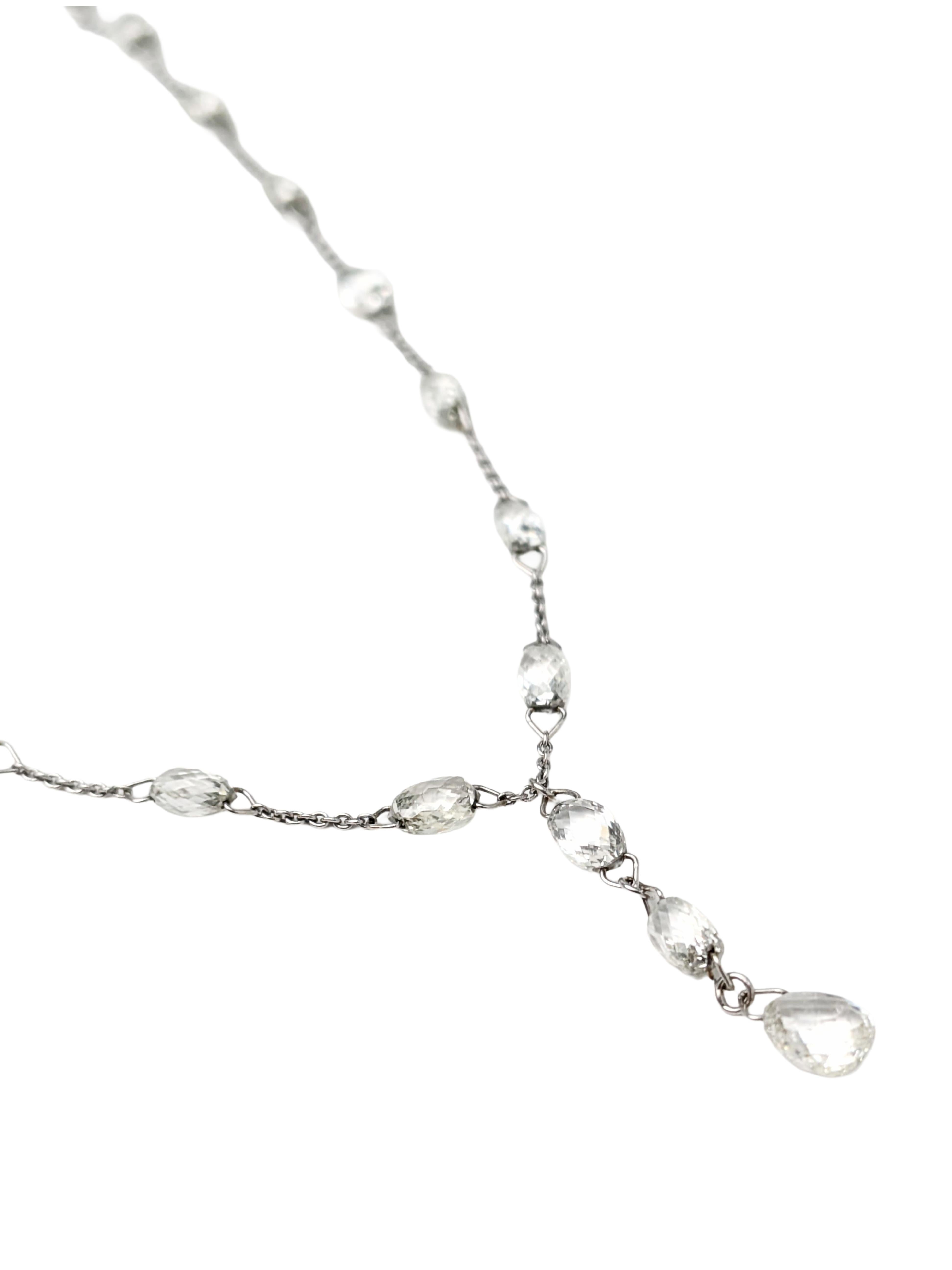 A refined essential with effortless sparkle. This delicate 18K white gold necklace features faceted white diamond beads hand-wrapped in 18K white gold wire and spaced gracefully along the chain, creating a soft shimmer with every movement. At its