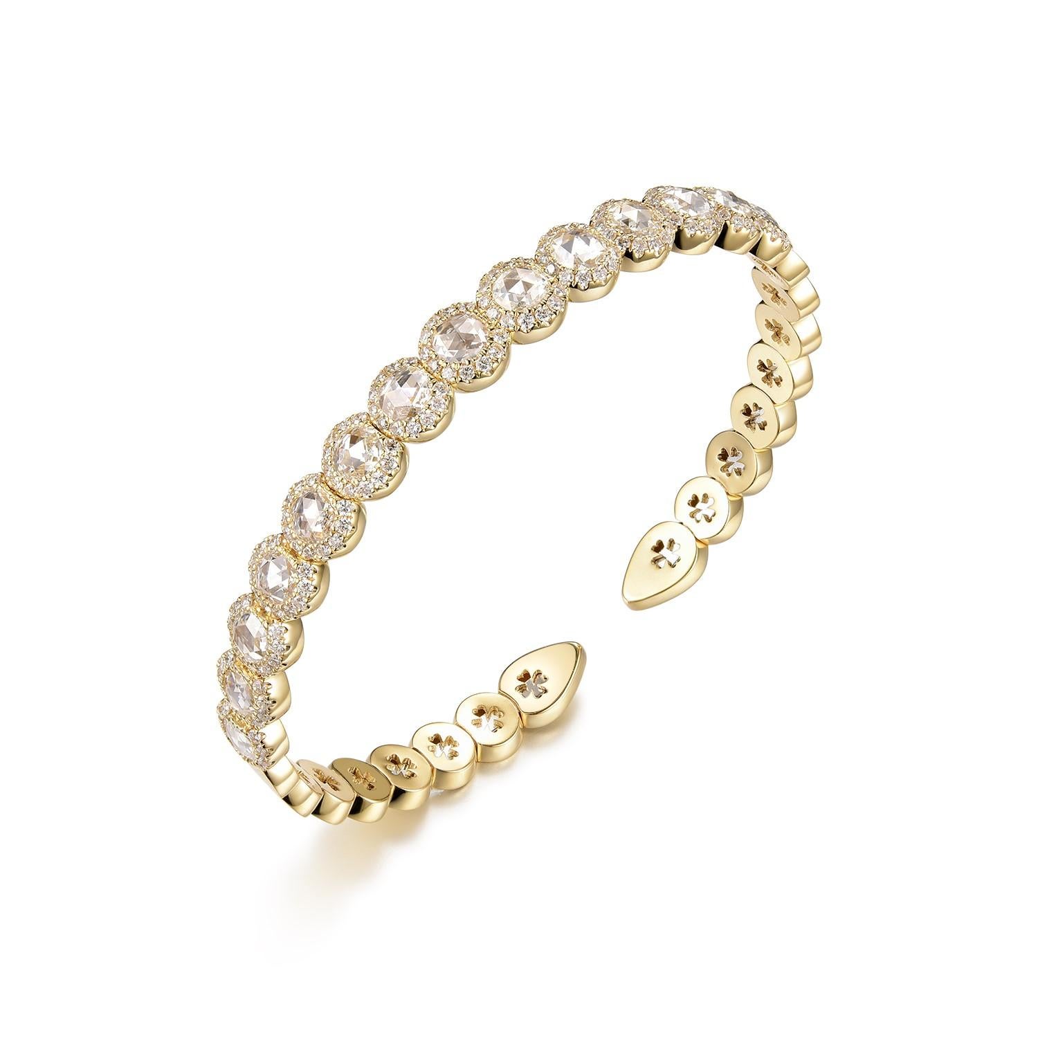 This bracelet is a radiant treasure, meticulously crafted from 18-karat yellow gold. It presents an alluring array of rose cut diamonds, collectively weighing 1.68 carats, their vintage-inspired facets reminiscent of the soft bloom of a rose, giving