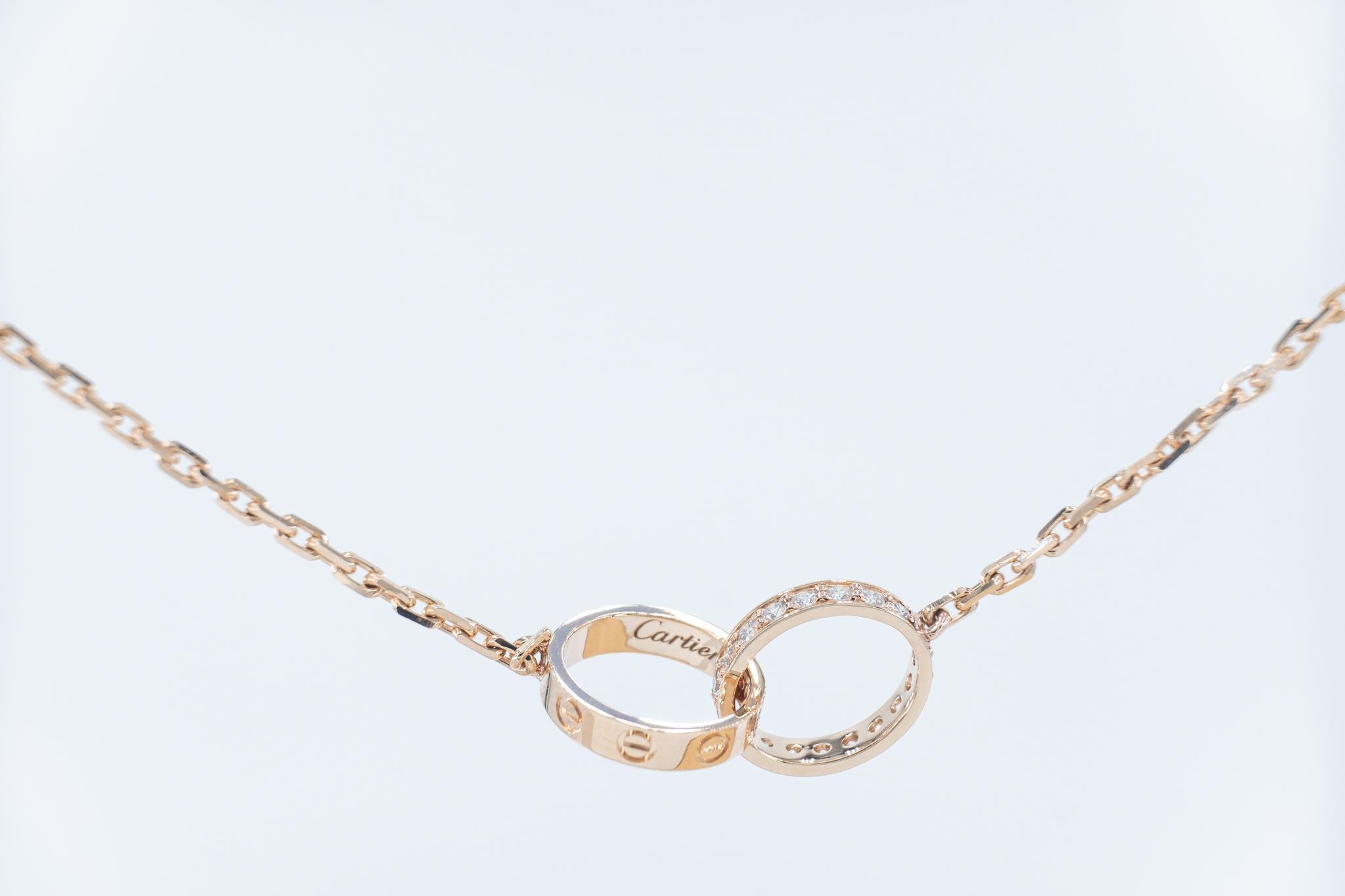 Contemporary Cartier Love 18 Round Brilliant Cut Diamonds 0.22 Carat Double Ring Necklace  For Sale