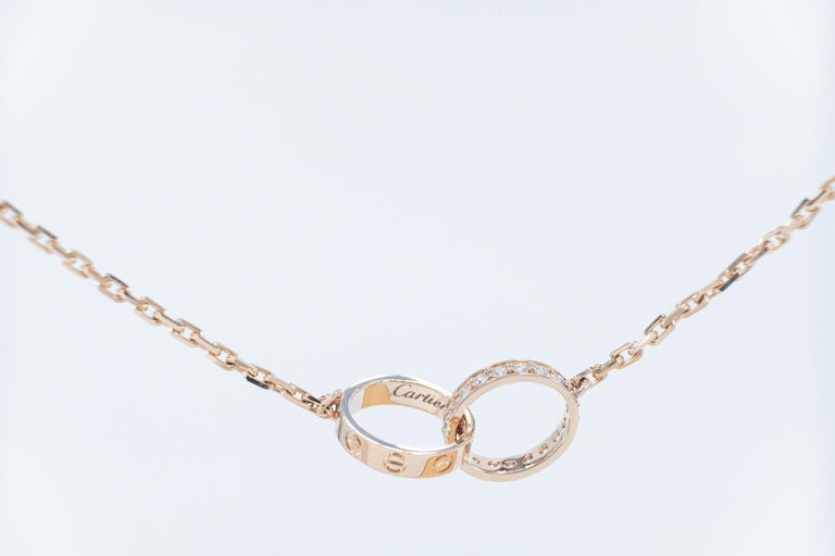 Cartier Love 18 Doppelring-Halskette mit runden Diamanten im  Brillantschliff 0,22 Karat im Angebot bei 1stDibs