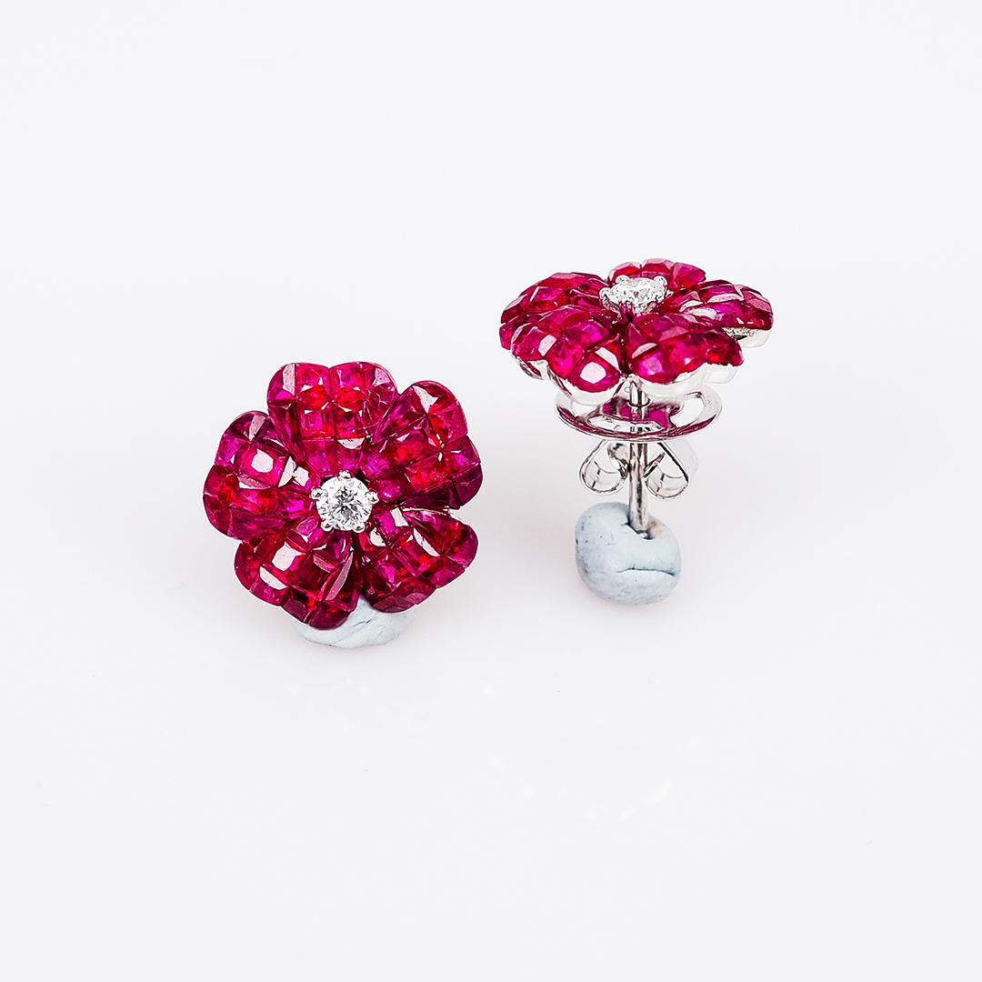 A lovely ruby stud earrings that you can use as everyday.We use the top quality Ruby for our invisible setting.It is deep red and very sparking. The invisible is a highly technique .We set the stone in perfection as we are professional in this kind