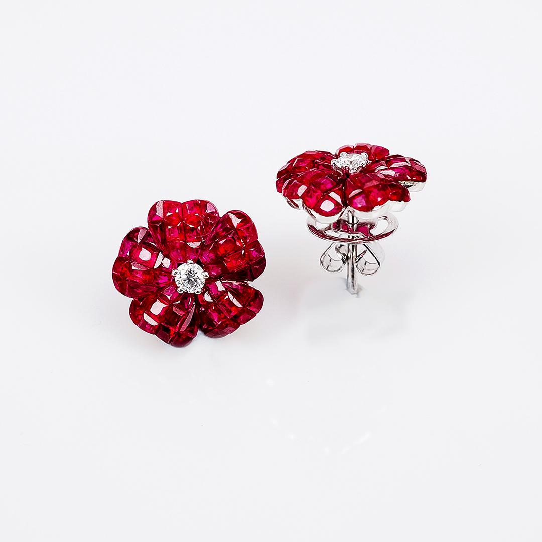 A lovely ruby stud earrings that you can use as everyday.We use the top quality Ruby for our invisible setting.It is deep red and very sparking. The invisible is a highly technique .We set the stone in perfection as we are professional in this kind