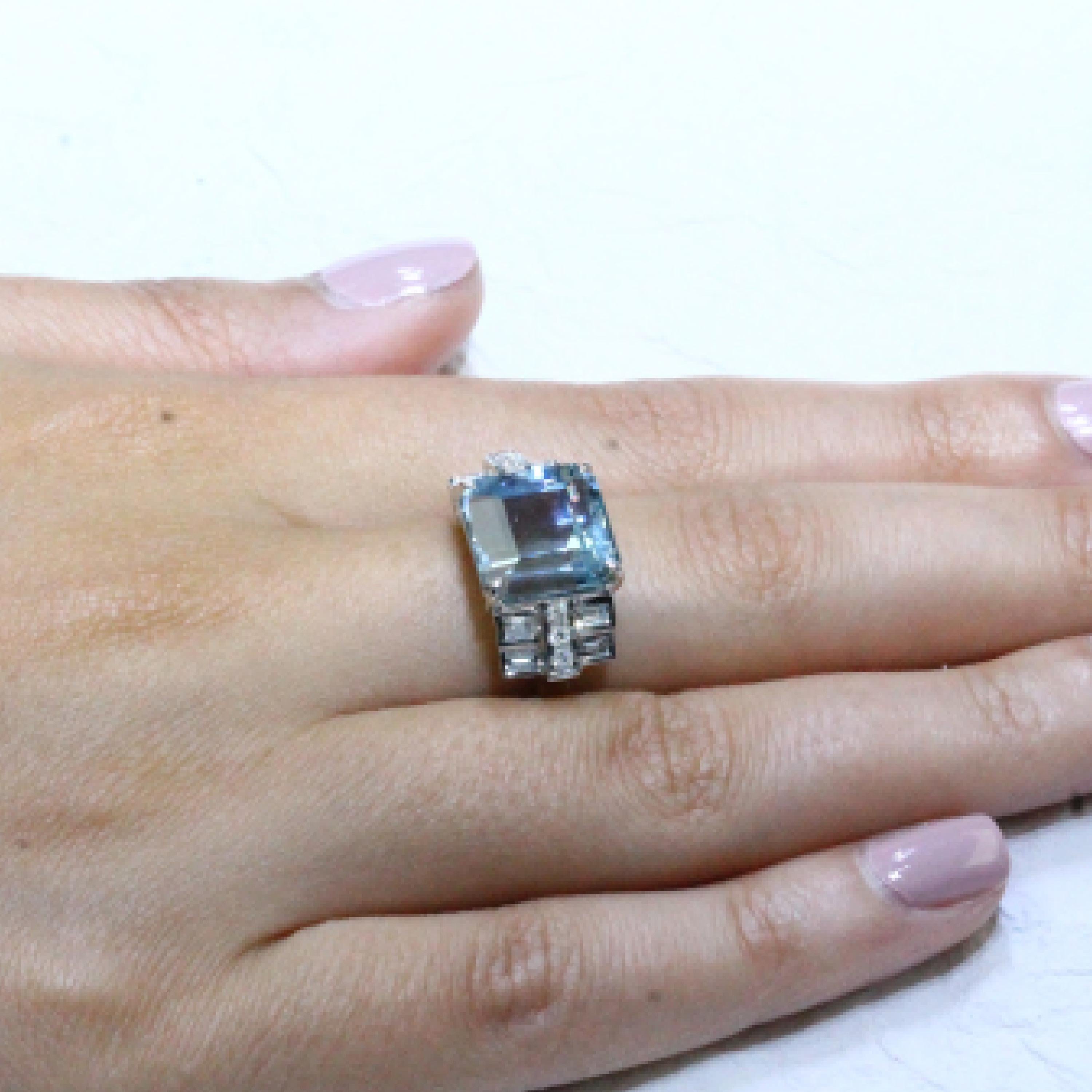 18K White Gold Ring Featuring a Square 6.58 carat Aquamarine, accented by Round and Baguette Diamonds. Finger size 6.5, adjustable upon request/quote. Aquamarine evokes the purity of crystalline waters, and the exhilaration and relaxation of the